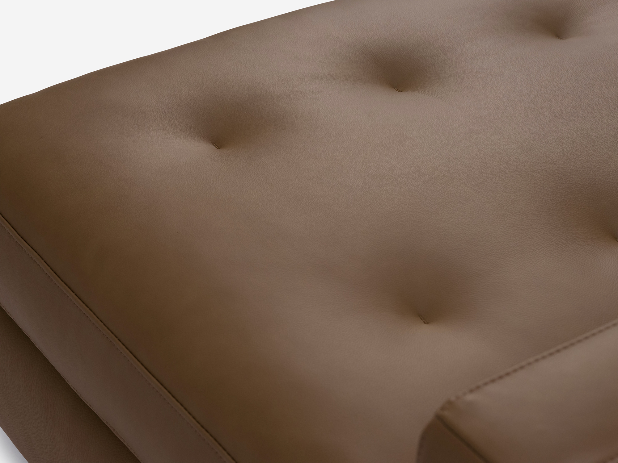 Cushion detail view of the Joan loveseat in brown leather