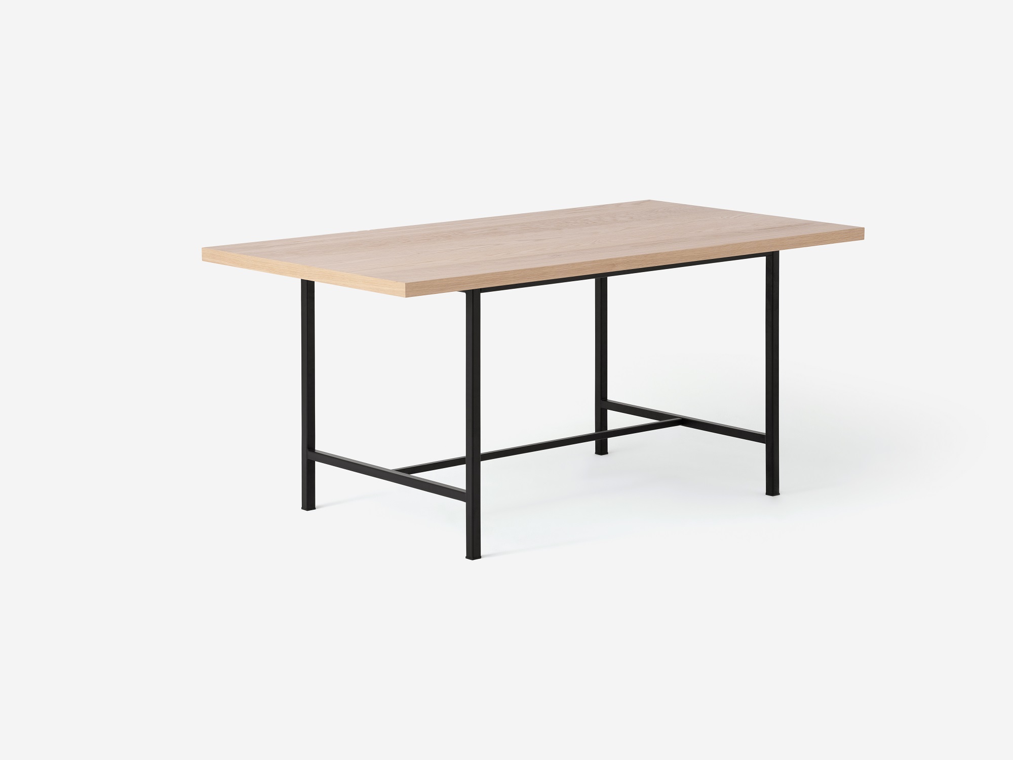 Angled view of the Kendall 66" modern dining table with solid oak top and black base