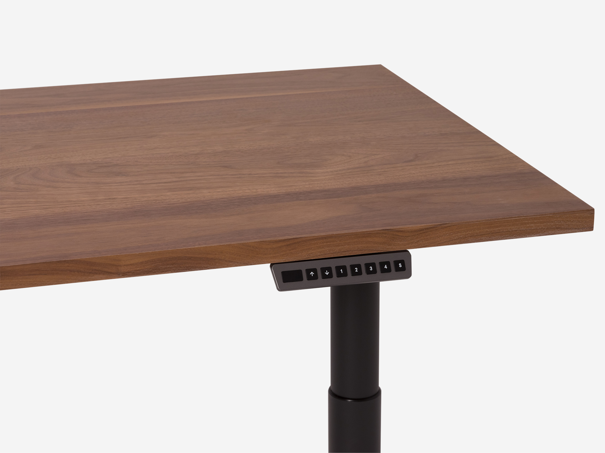 Detail view of walnut standing desk