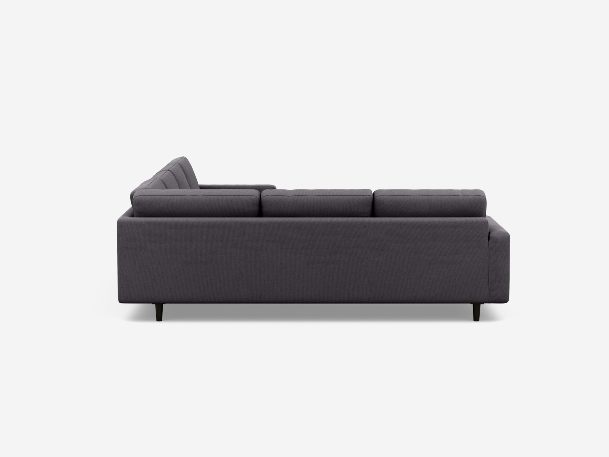 Back view of the Oskar l shape sofa in dark grey fabric.