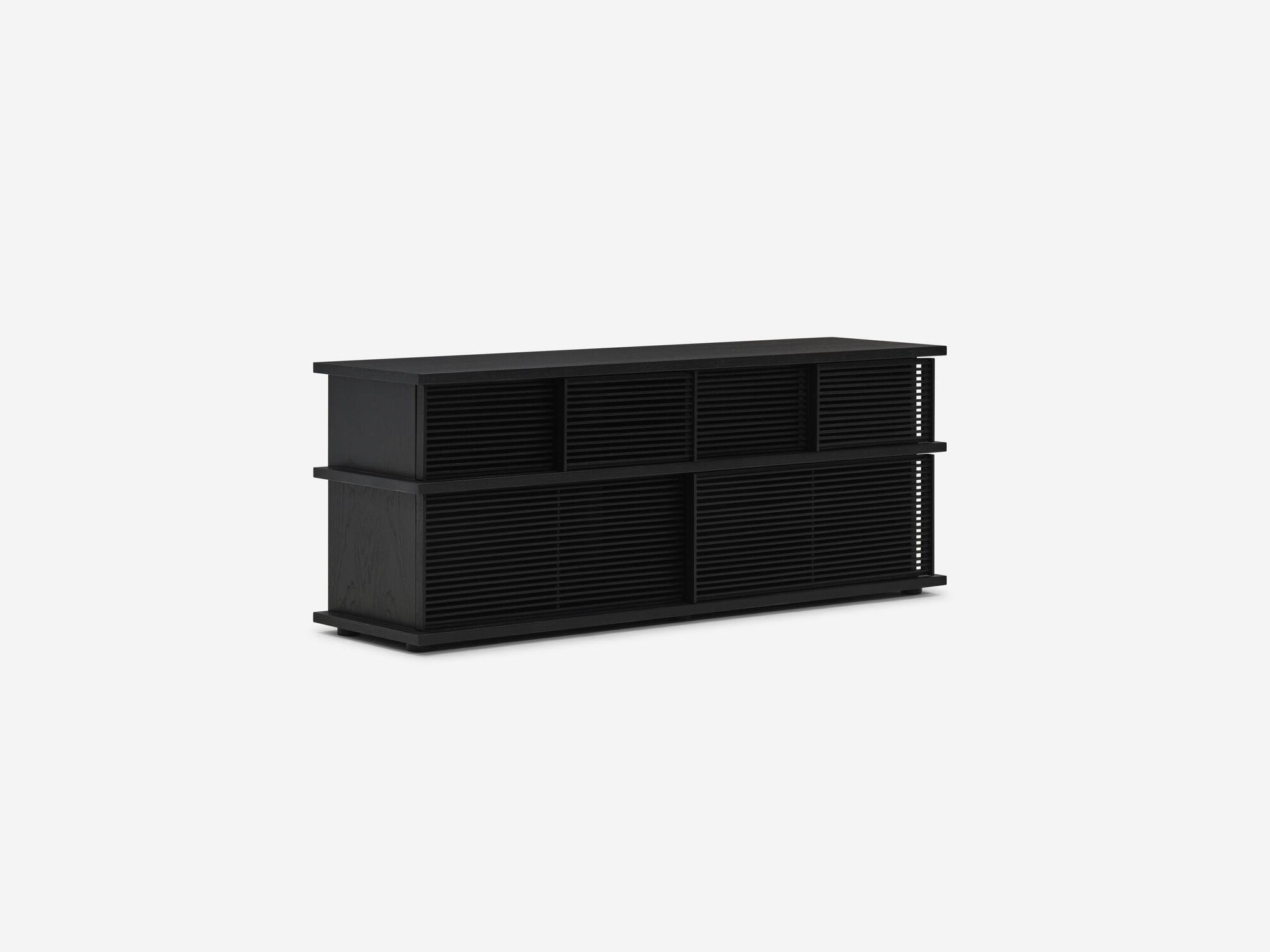 Tall black oak media unit with slatted panels front angle closed storage