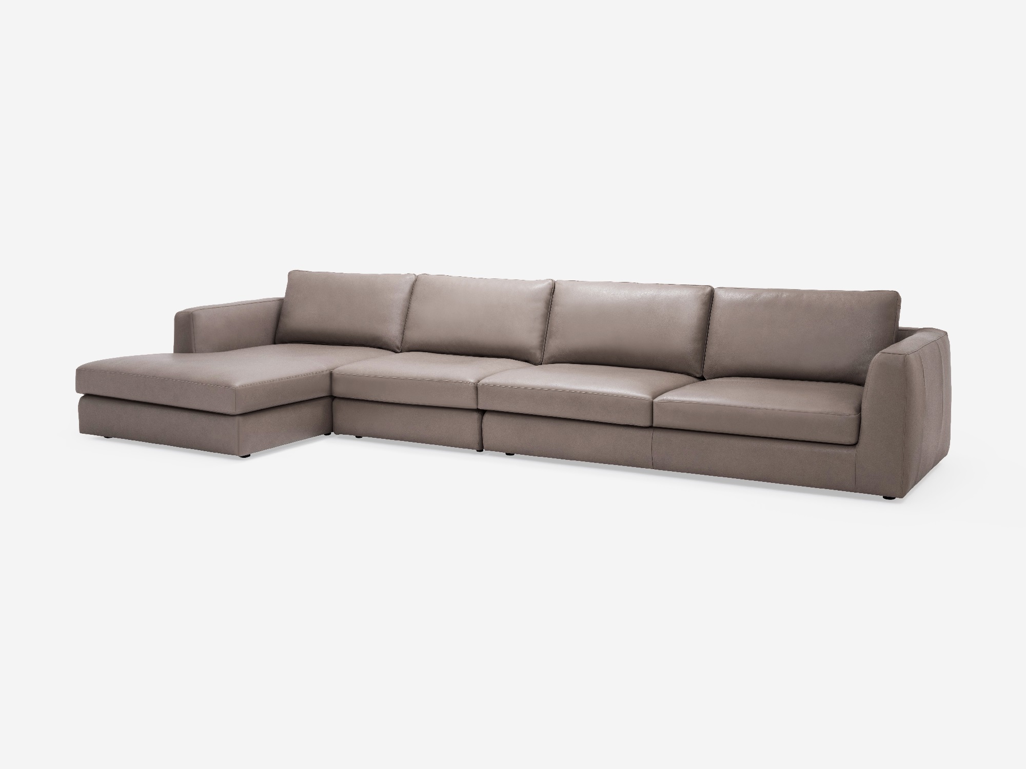 Corner view of the Cello modular sofa in beige leather with left hand chaise