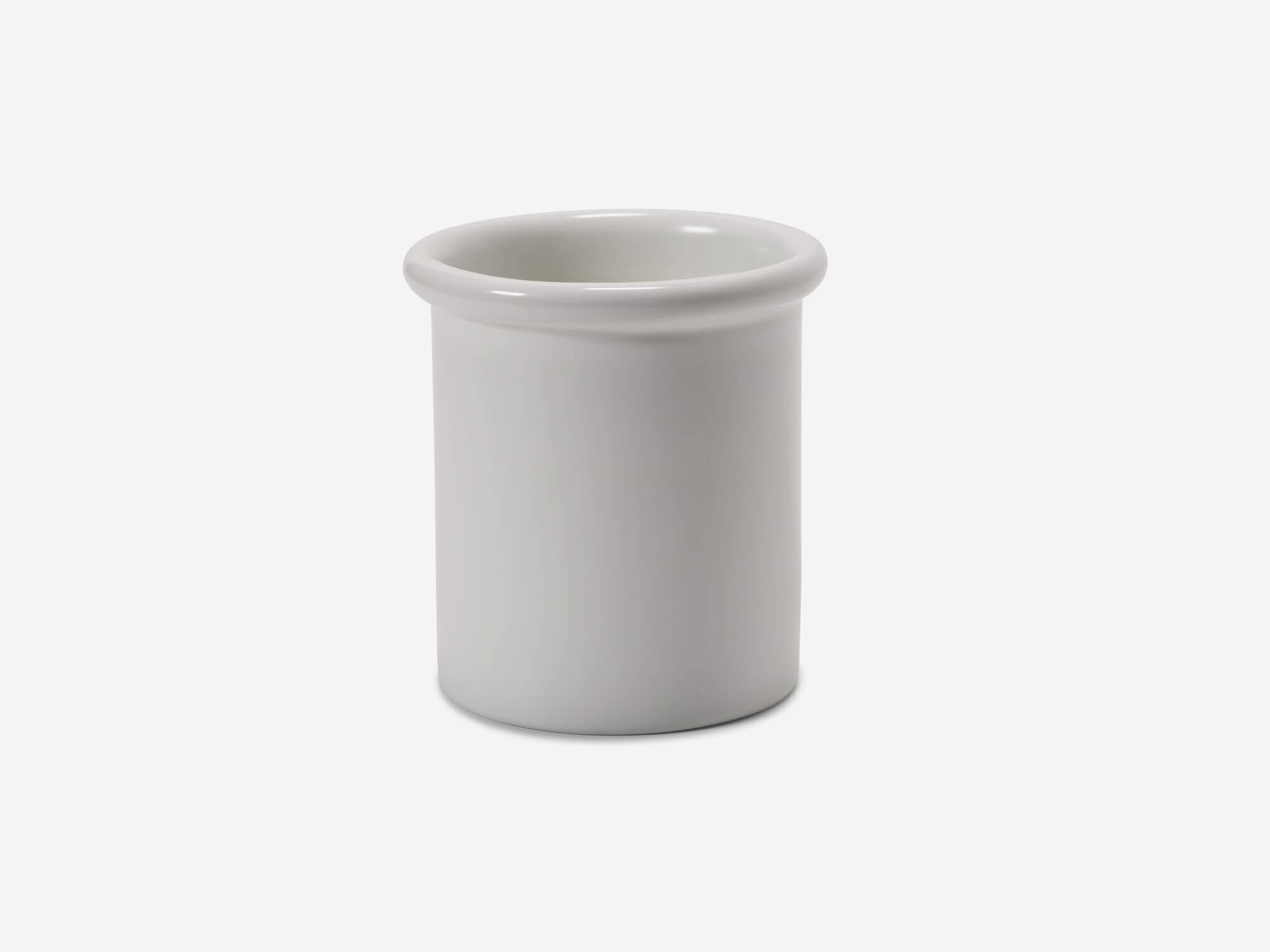 Front view of white porcelain toothbrush holder