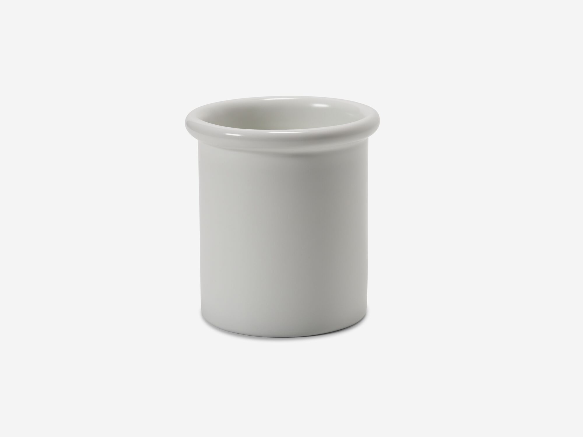Front view of white porcelain toothbrush holder