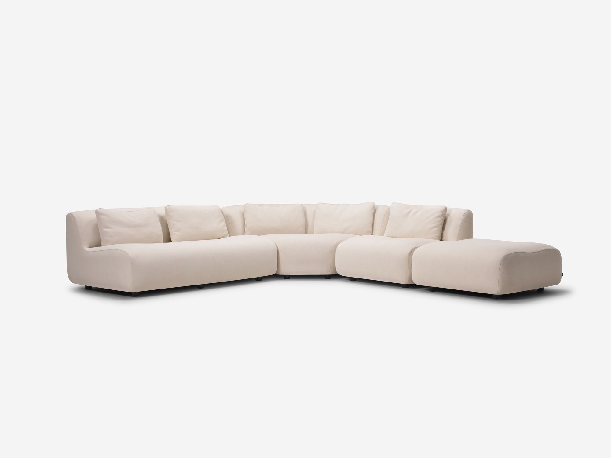 Beige armless sectional sofa front angle view