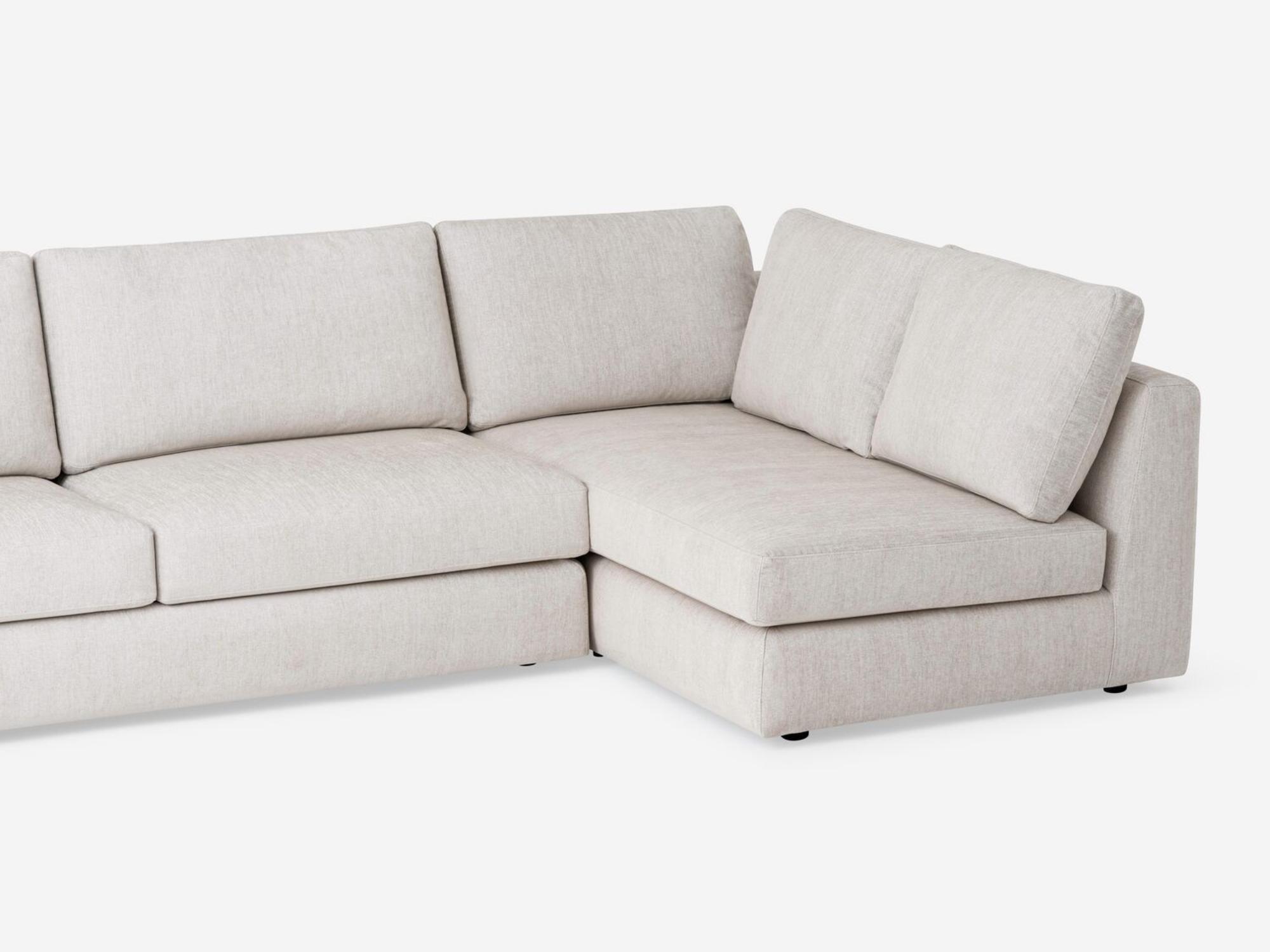 Detail view of the Cello modular sofa in white fabric chaise