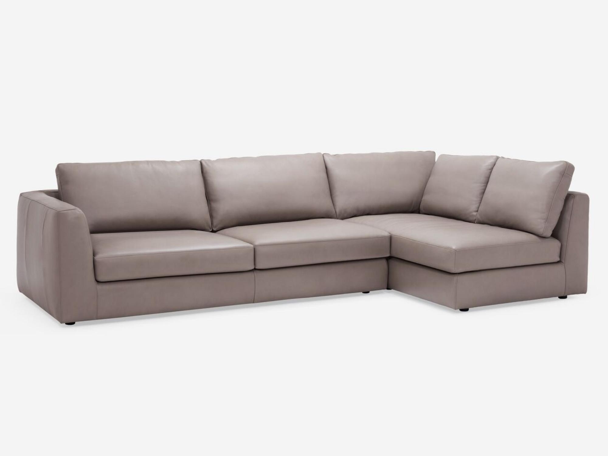 Angled view of the Cello modular sofa in beige leather