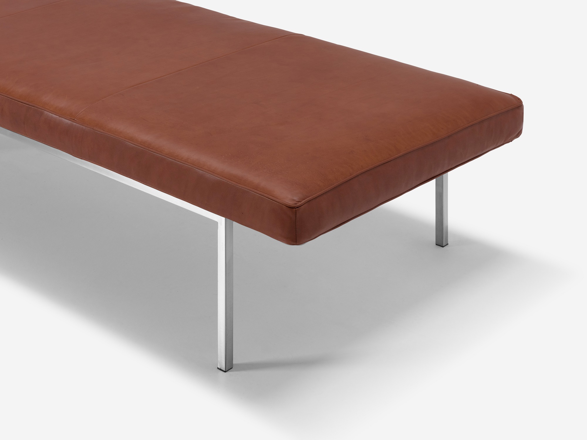 Detail view of the Bank upholstered dining bench in dark brown leather