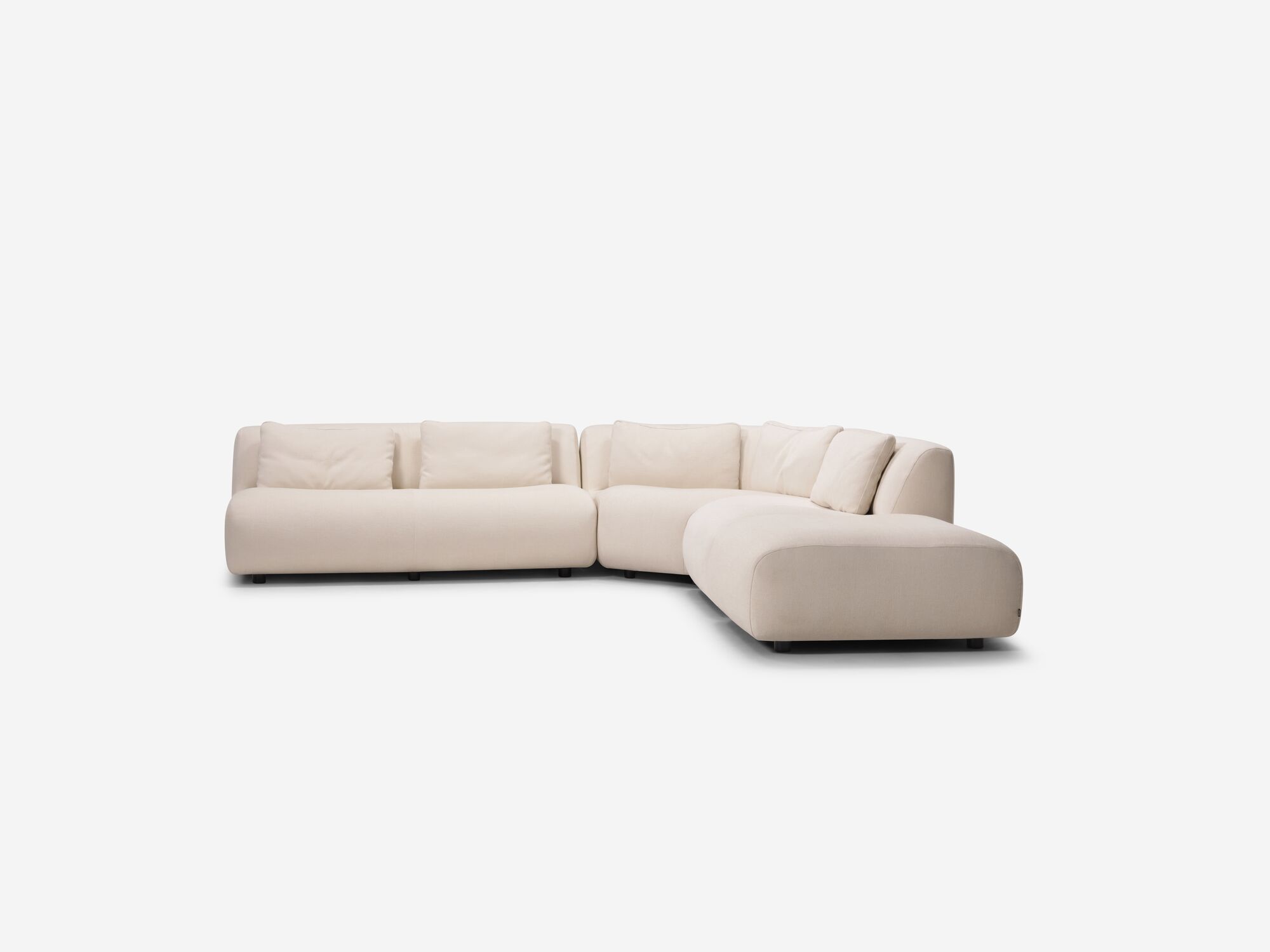 Front view of beige armless sectional sofa