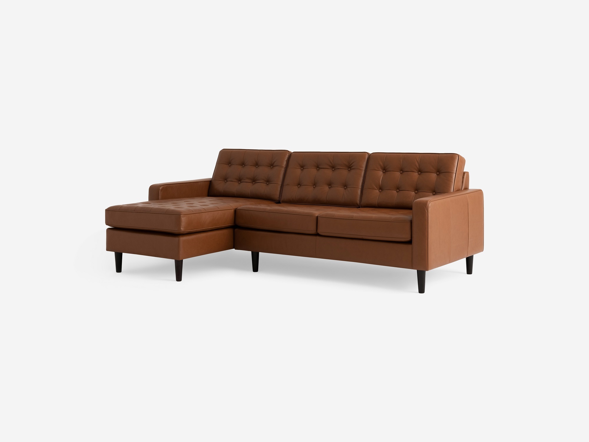 Front angled view of the  Reverie modern sectional sleeper sofa in brown leather with left hand facing chaise