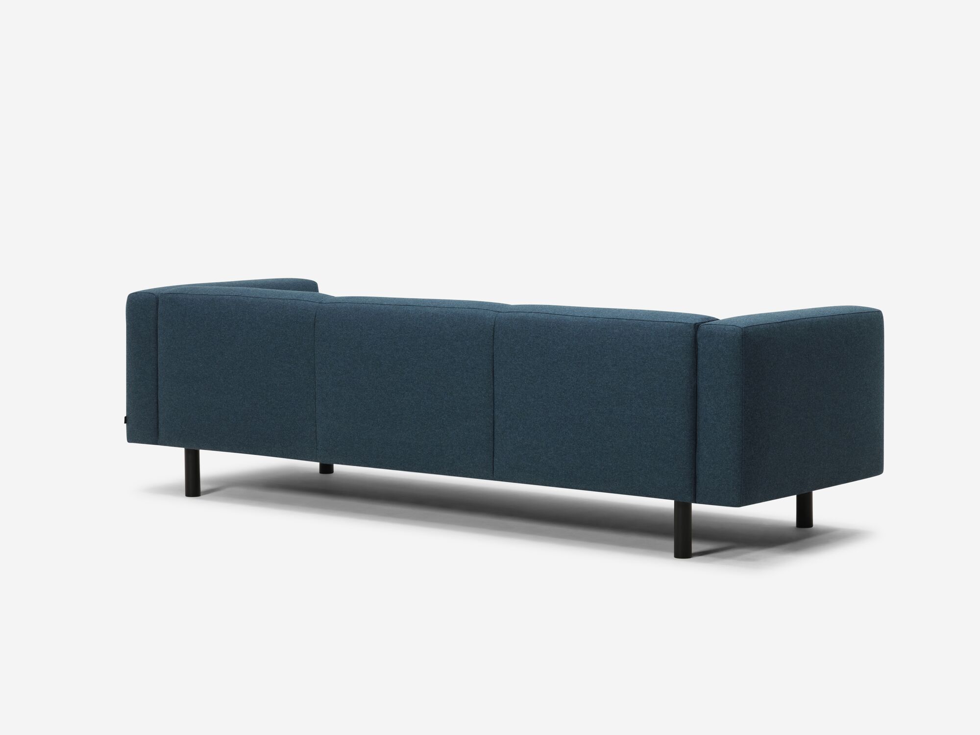 Back angle view of blue sofa