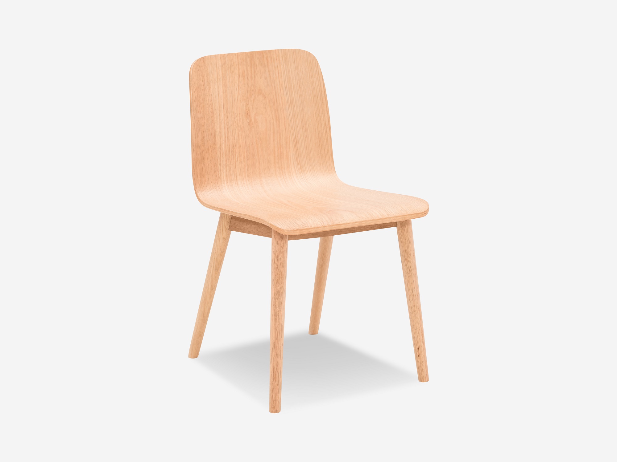 Detail angled view of the Tami mid century dining chair in light oak