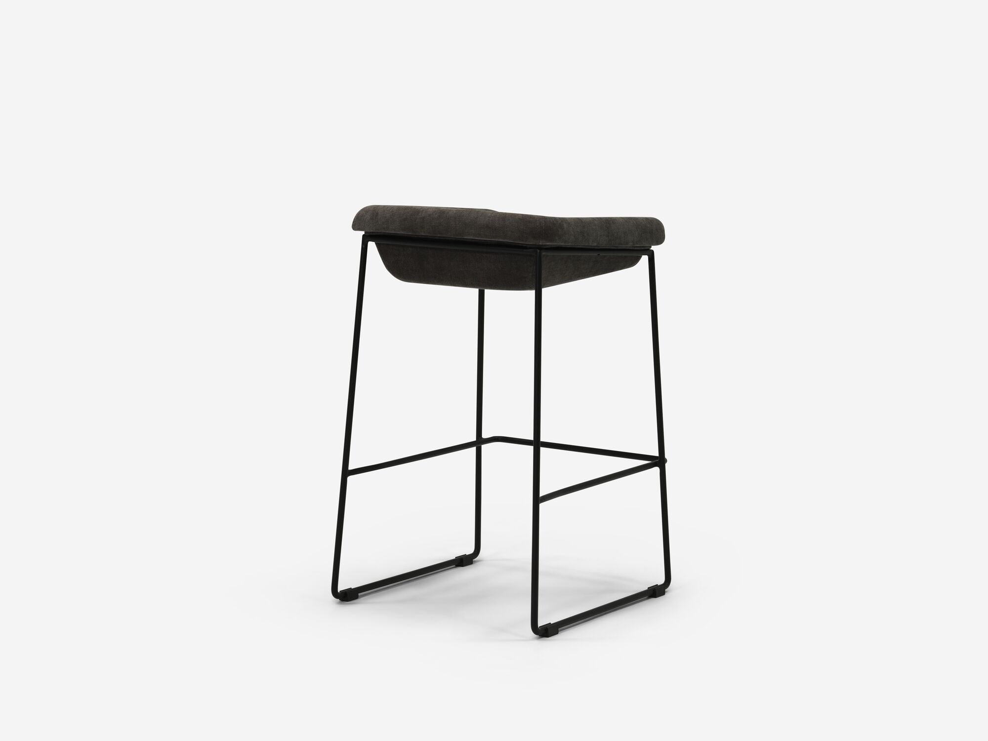 Counter stool with black seat and black legs back angle view