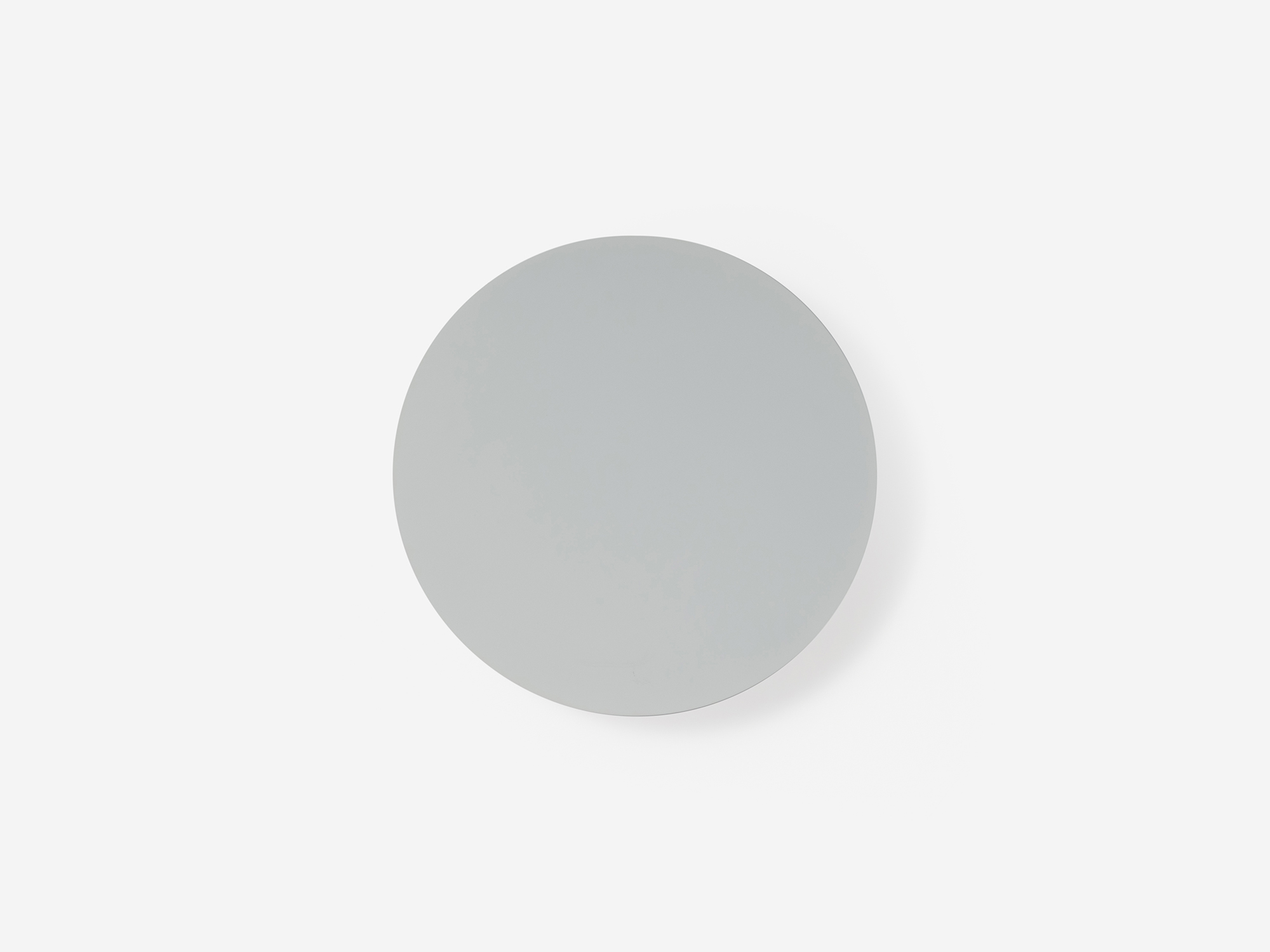 Straight on view of Klein white ceiling lighting fixture with light off