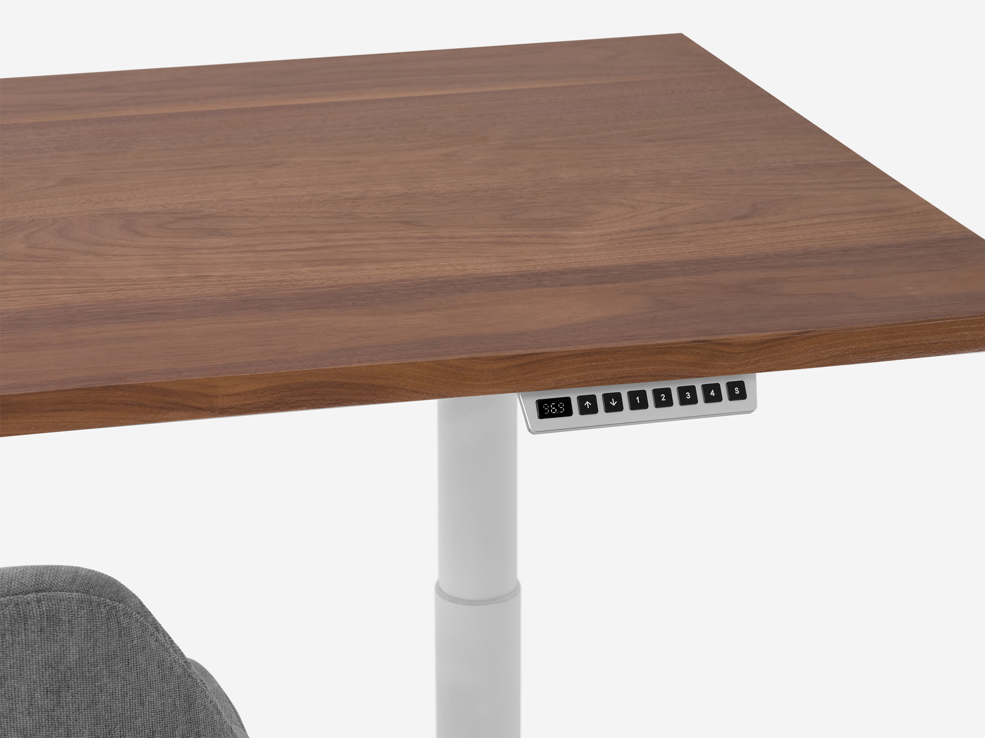 Detail view of walnut standing desk