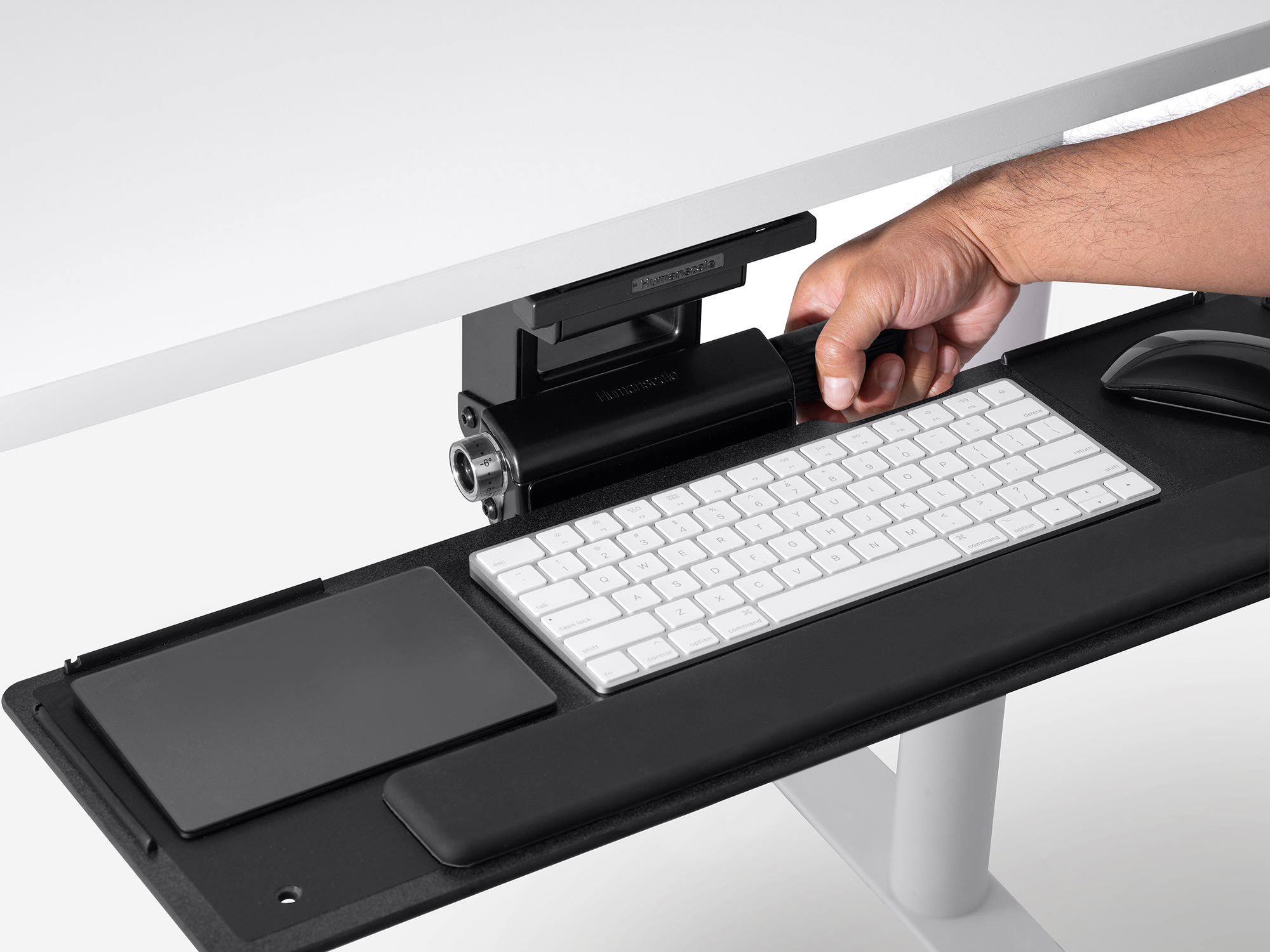 black optional keyboard tray shown being adjusted