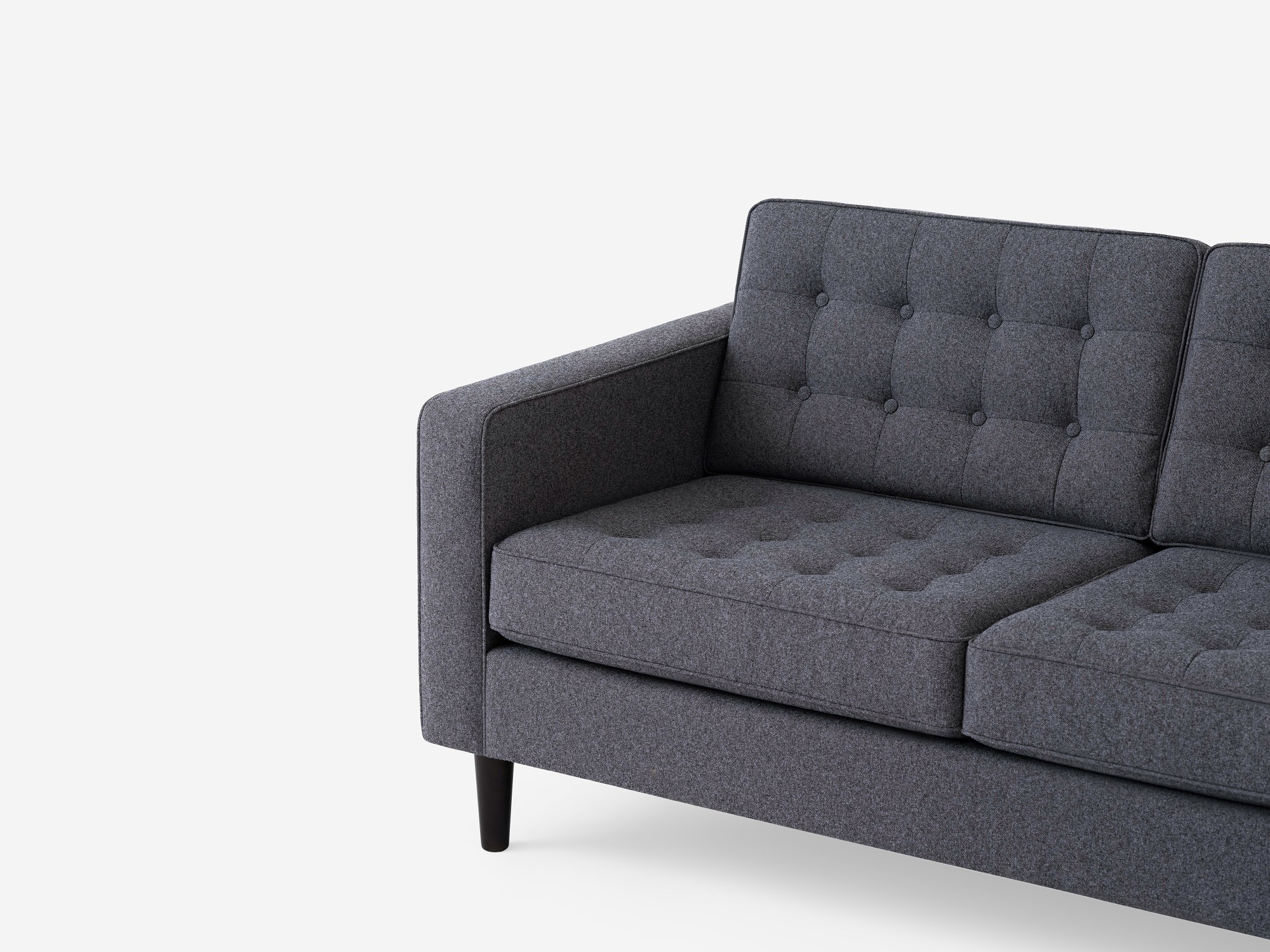 Detailed view of the  Reverie modern sectional sleeper sofa in gray fabric