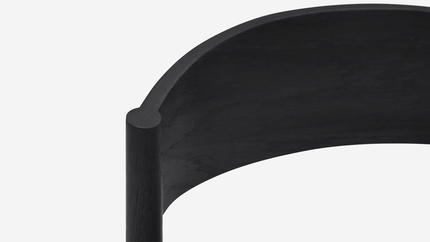 Detail view of black oak and grey modern dining chair