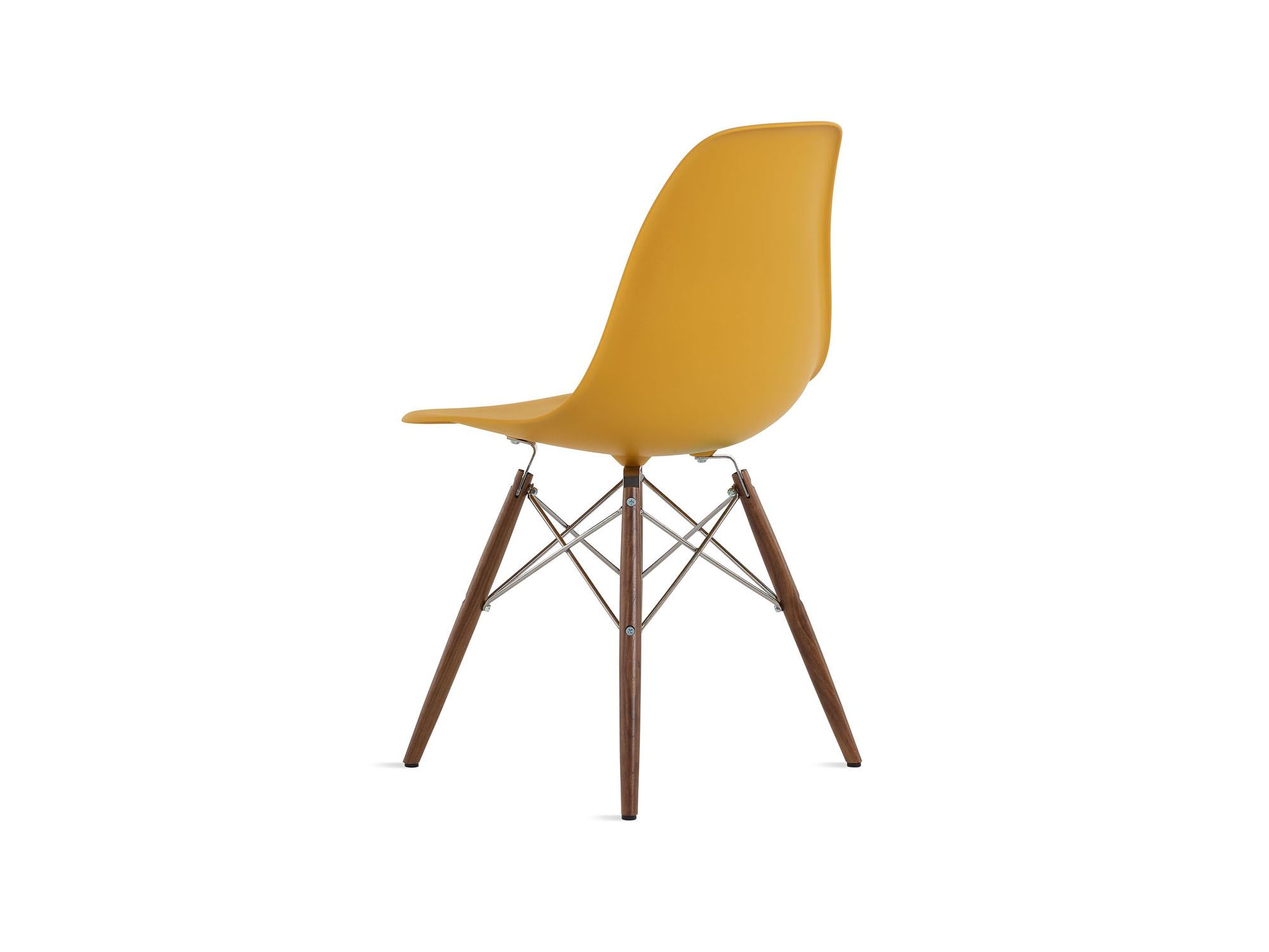 Back angle view of yellow chair with walnut dowels