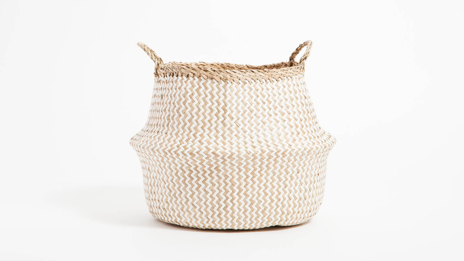 Side view of the large beige and white Trundle basket