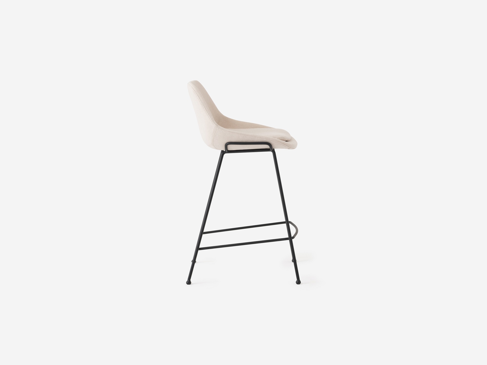 Side view of the Nixon counter stool in white fabric