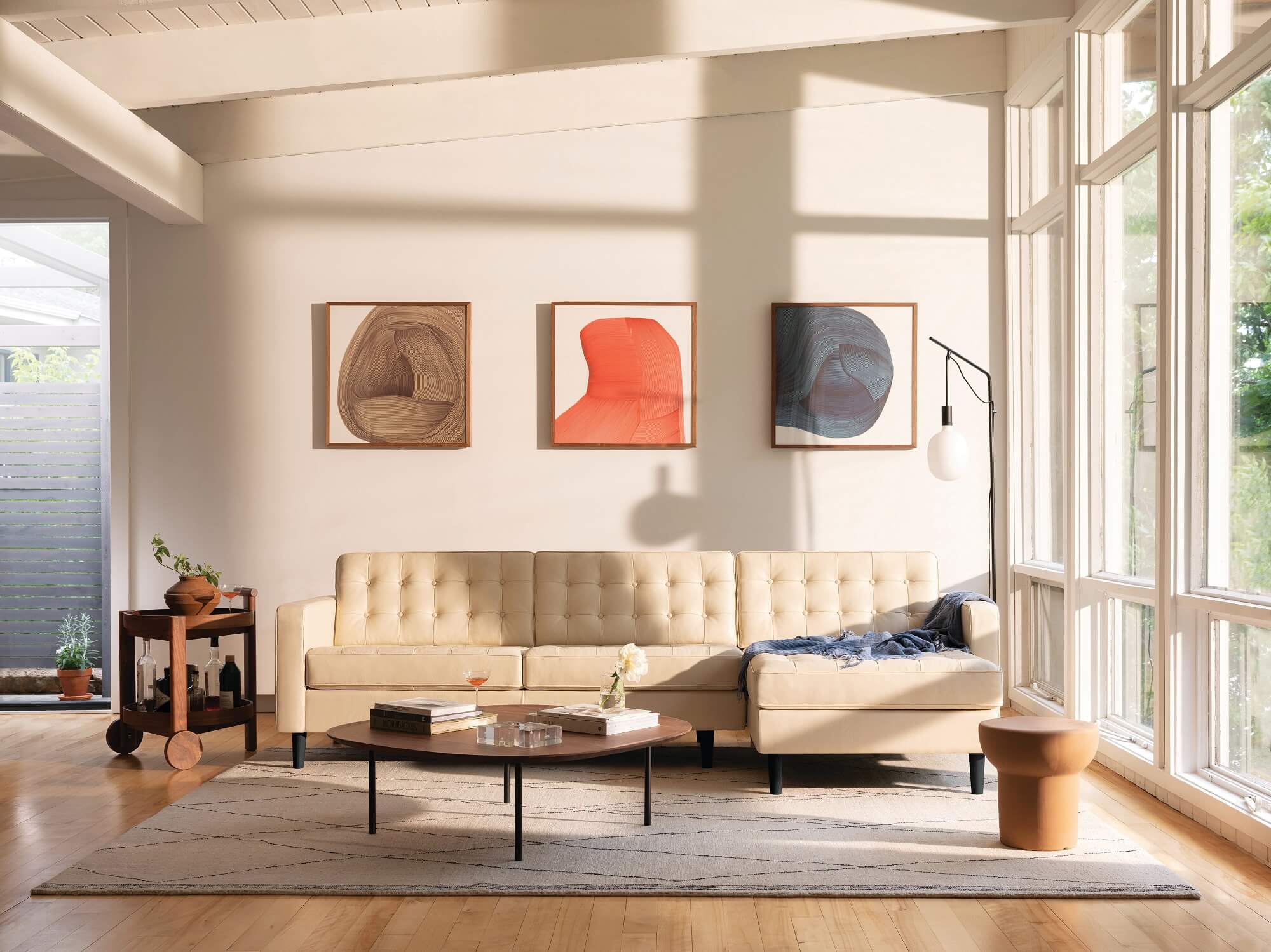 leather sectional sofa and walnut coffee table in a modern living room