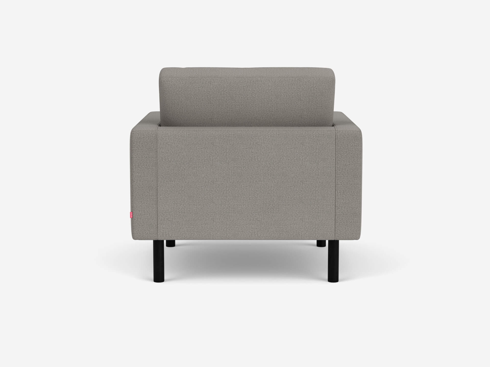 Back view of grey tufted armchair