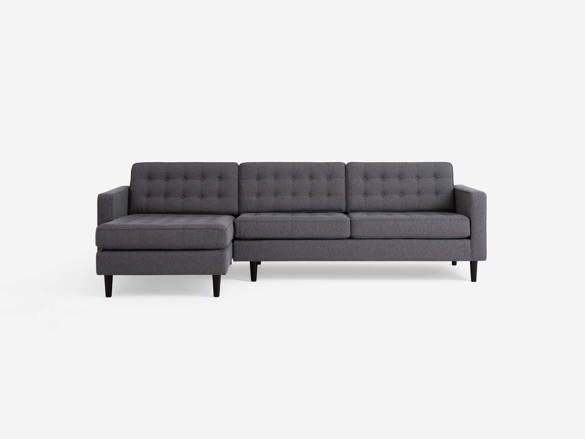 Front view of the  Reverie modern sectional sleeper sofa in beige fabric with left hand facing chaise