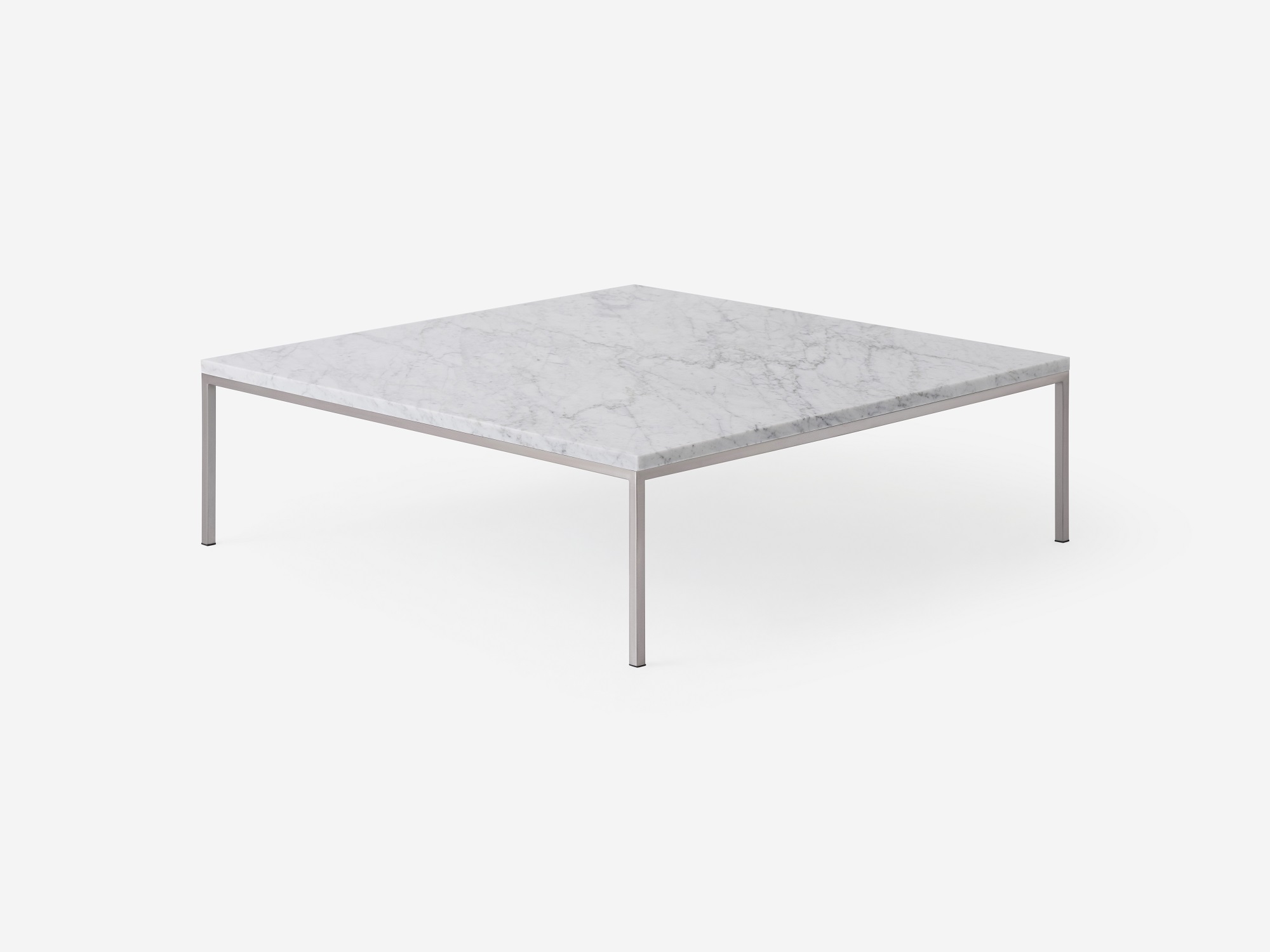 Corner view of the square white marble top granite coffee table