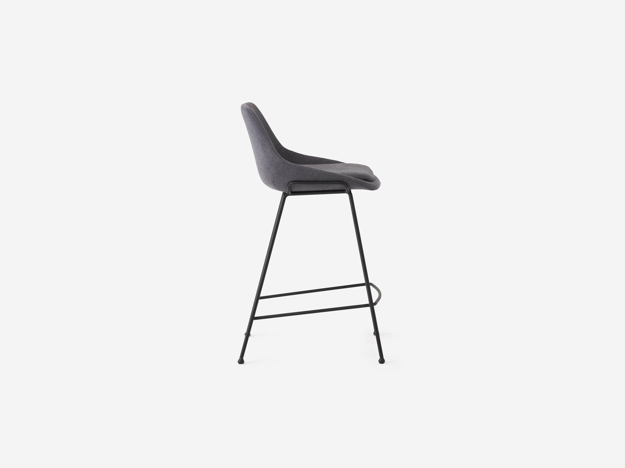 Side view of the Nixon counter stool in grey fabric