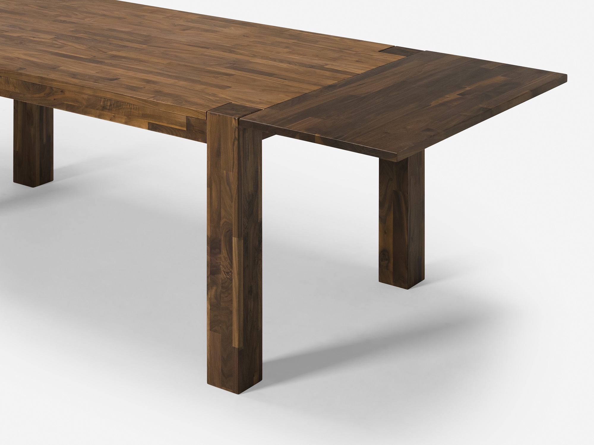 Small walnut Harvest rustic dining table detail view with leaf