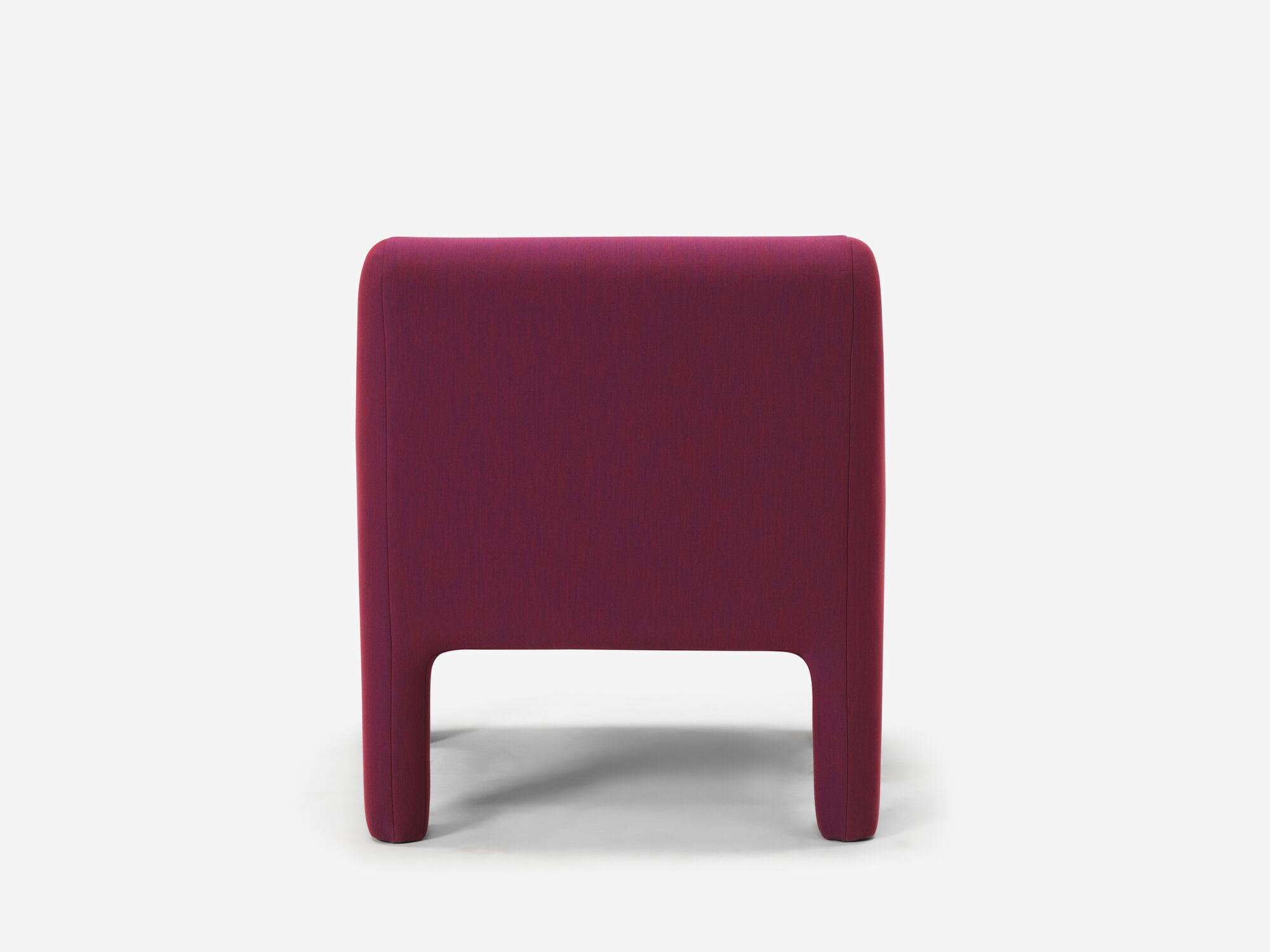 Back view of organic shaped red armchair