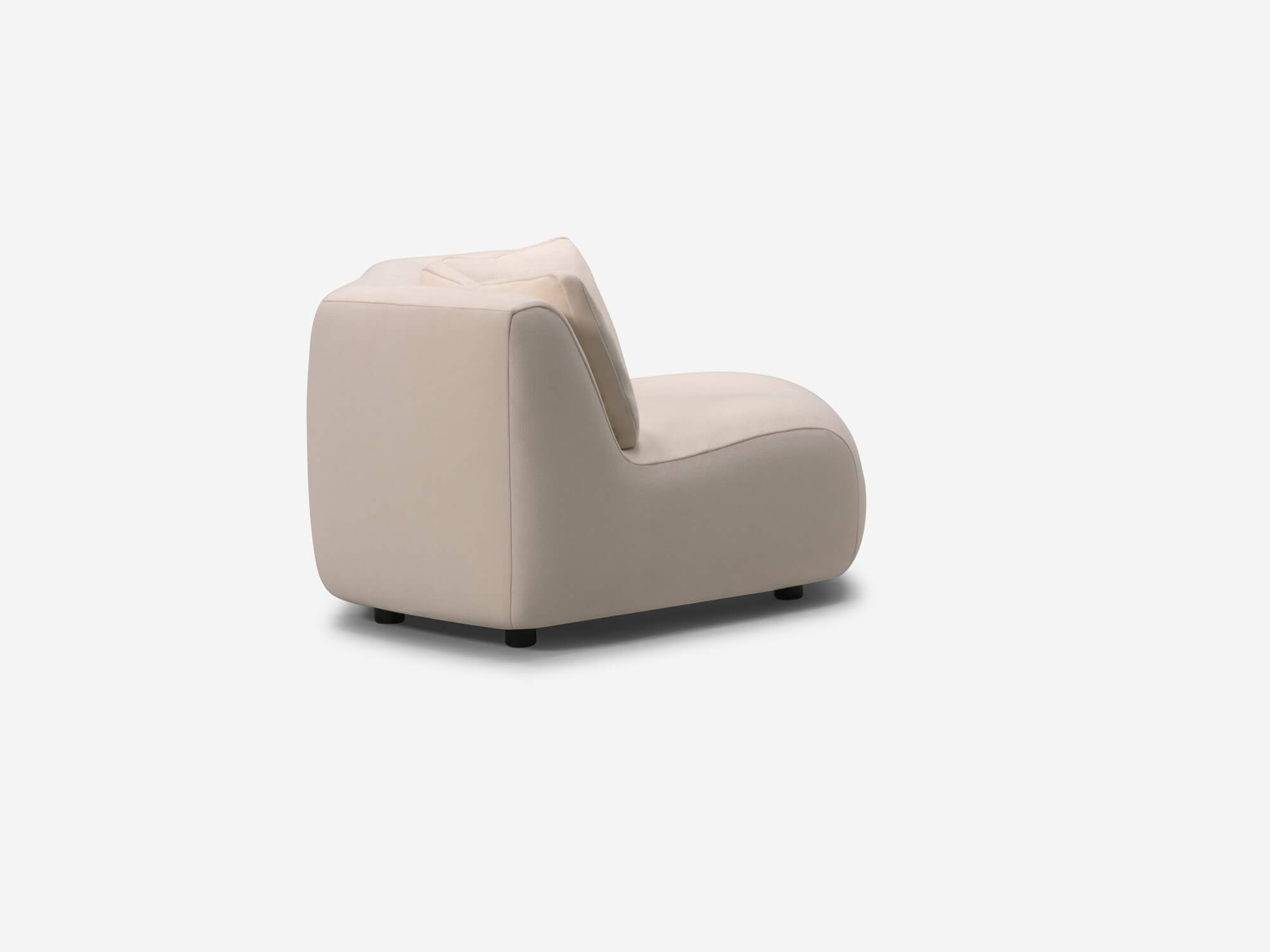 Side view of beige rounded corner chair