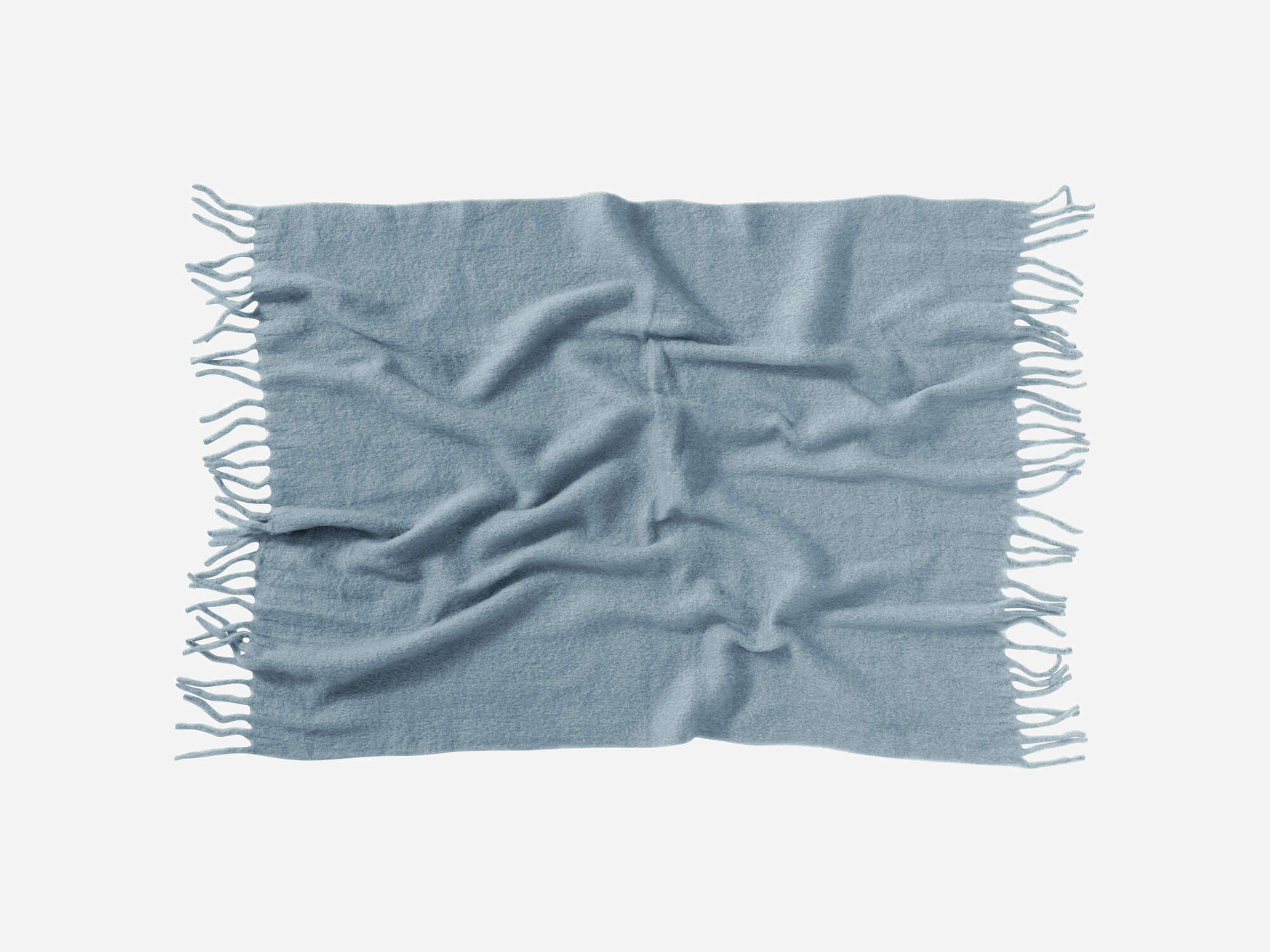 Top view of wrinkled blue wool throw with tassels