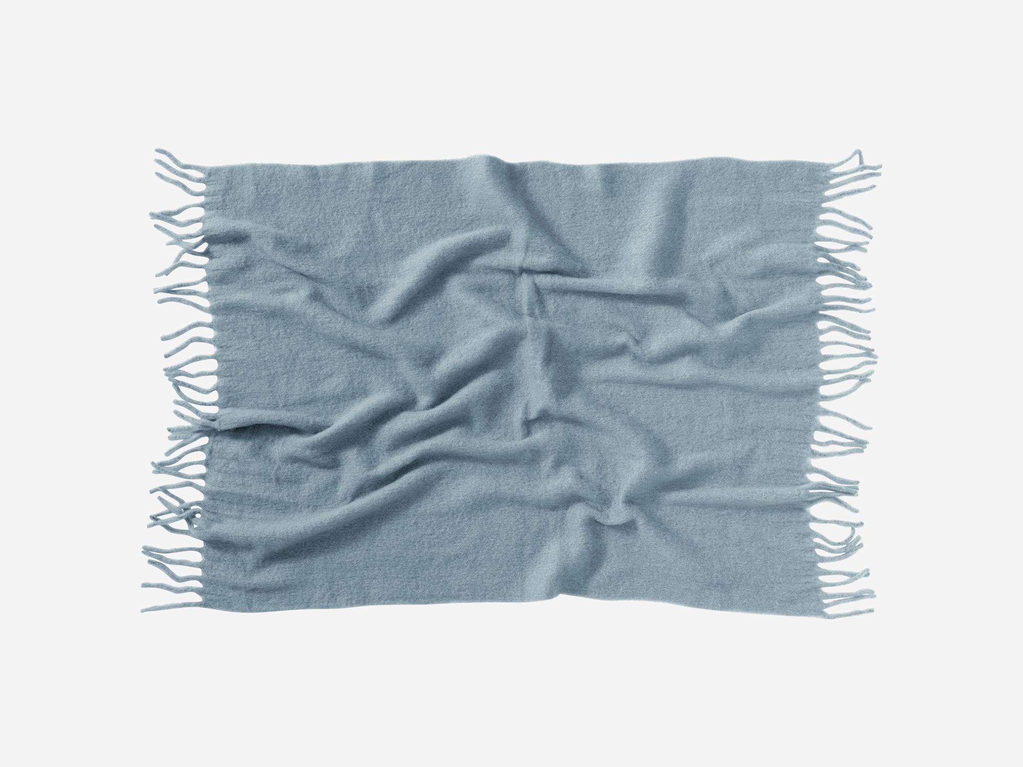 Top view of wrinkled blue wool throw with tassels