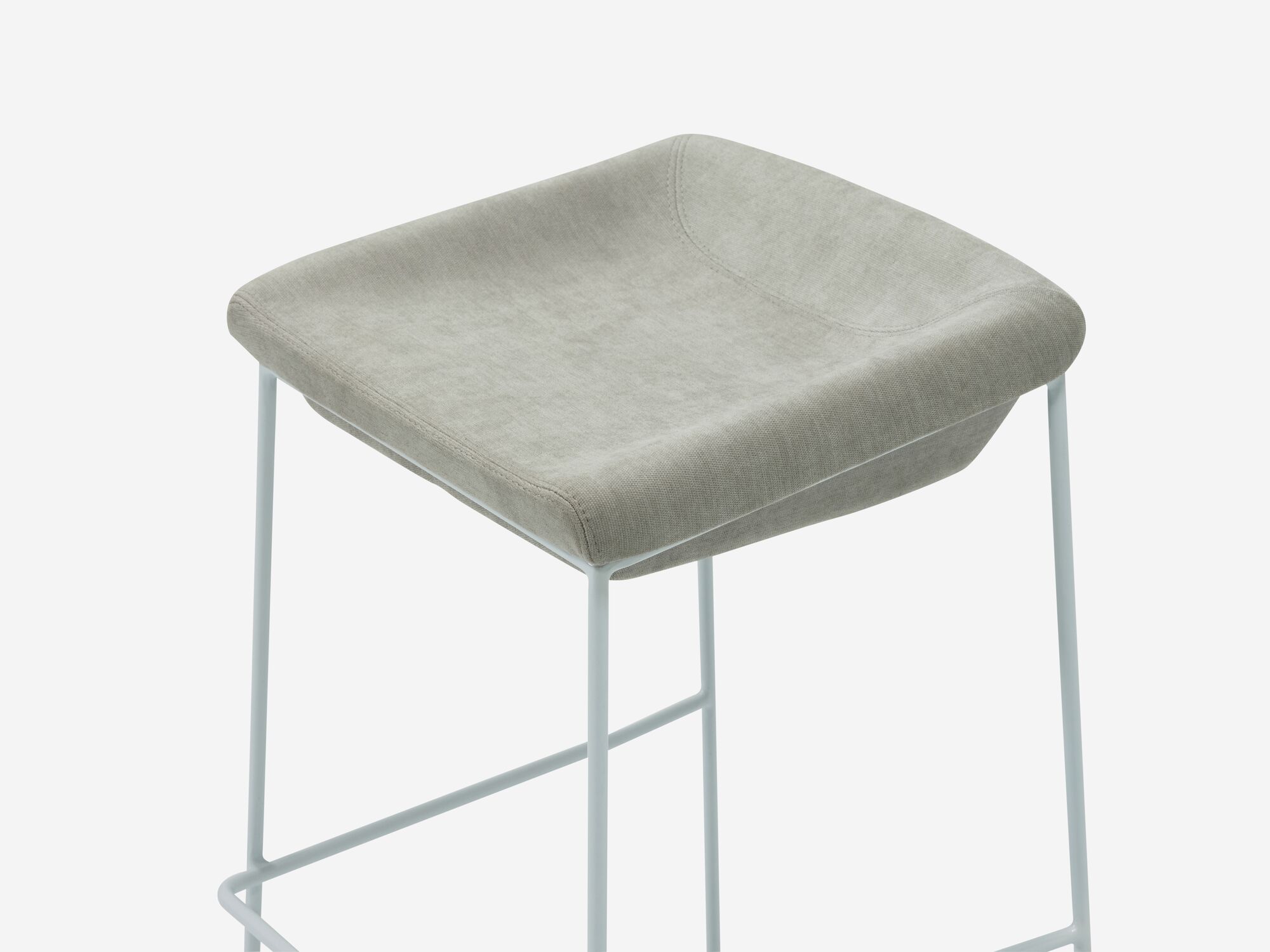 Counter stool with grey seat and white legs detail view