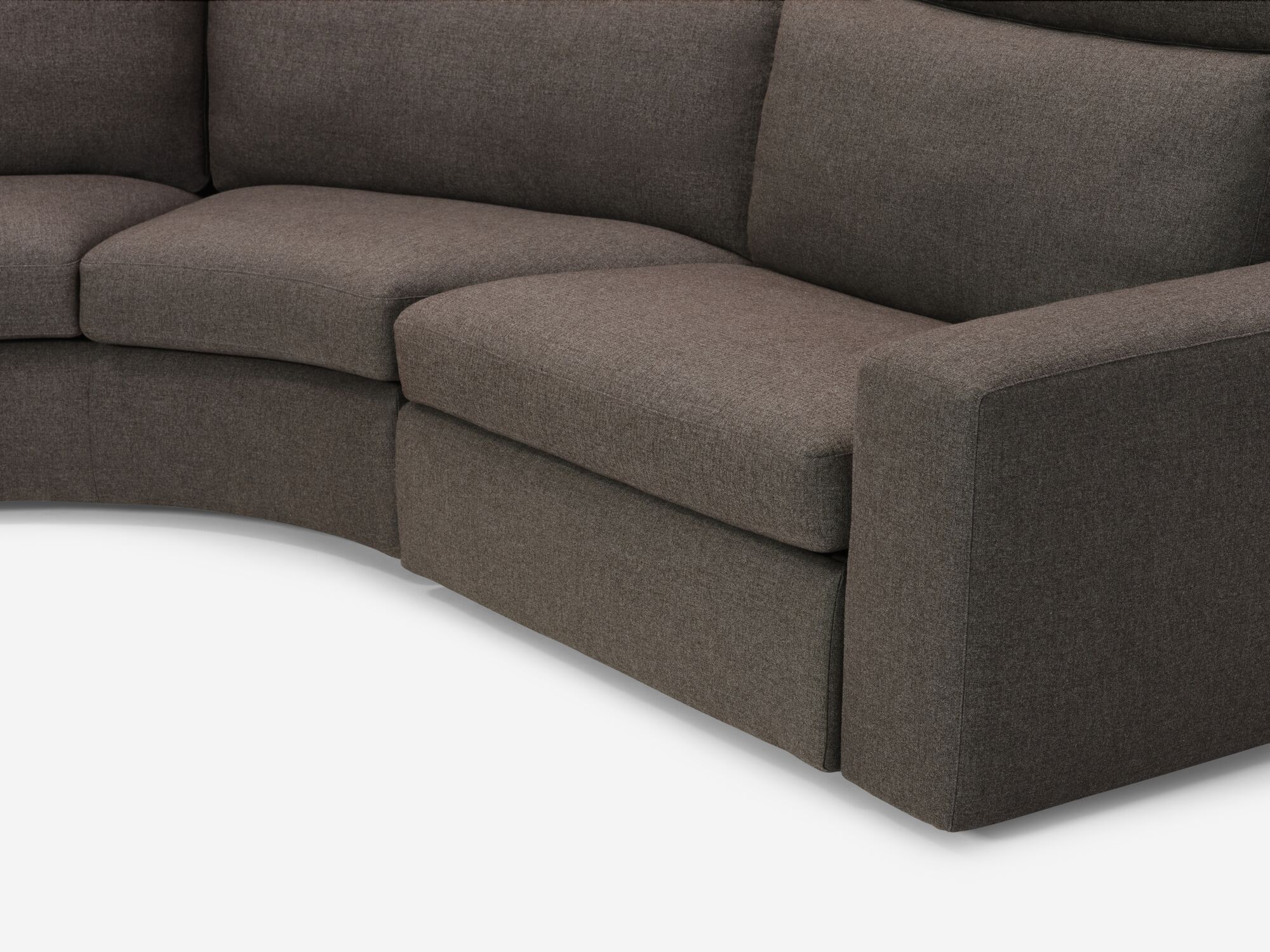 Arm detail view of charcoal reclining sectional