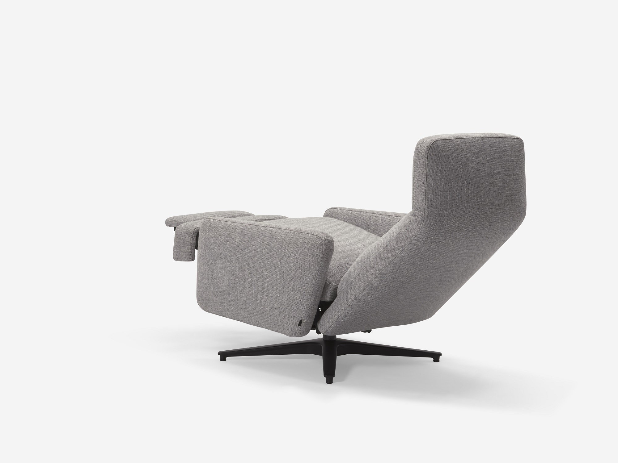 Back angle view of grey fabric reclining chair with seat reclined