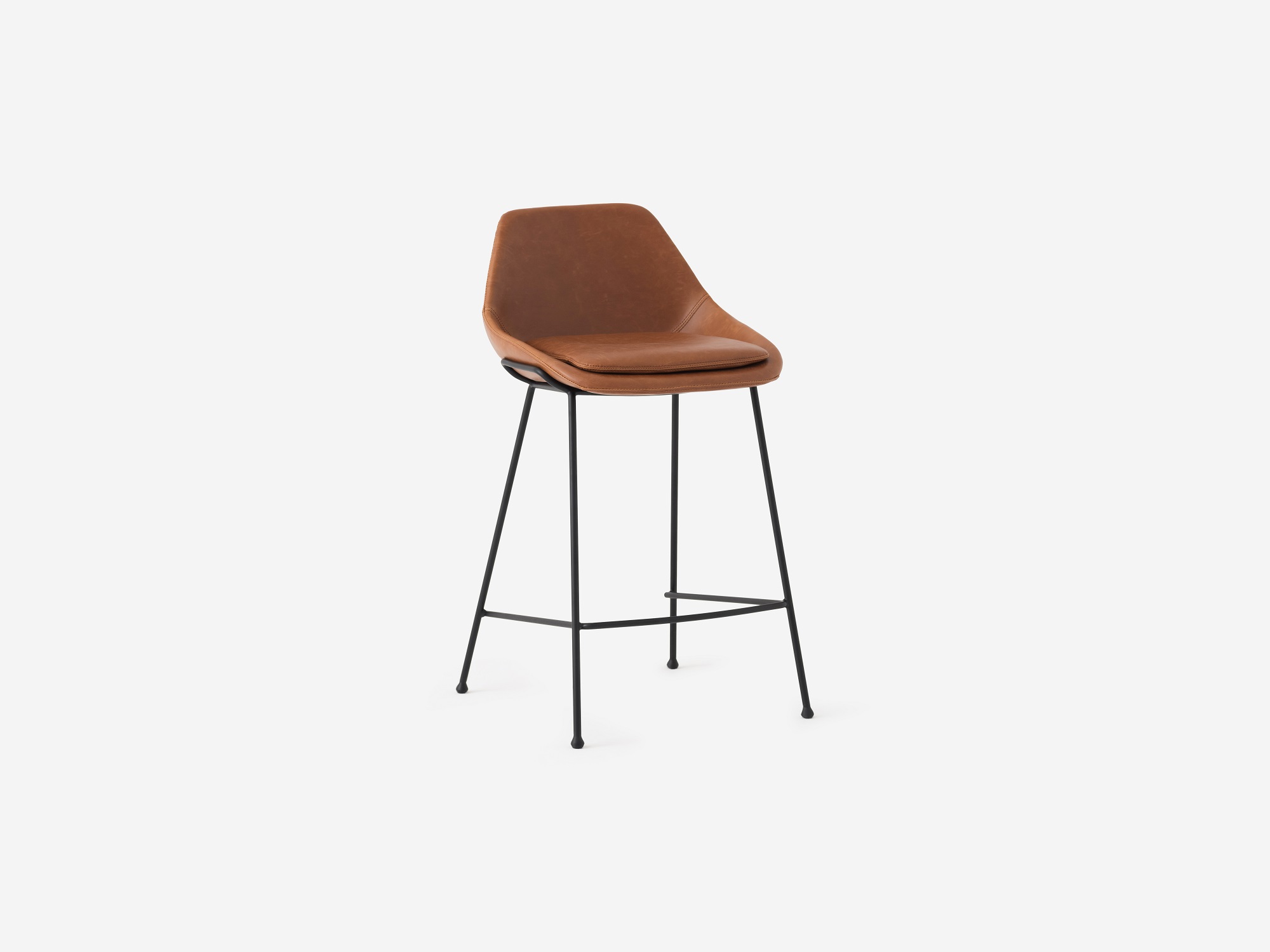 Angled view of the Nixon counter stool in brown leather