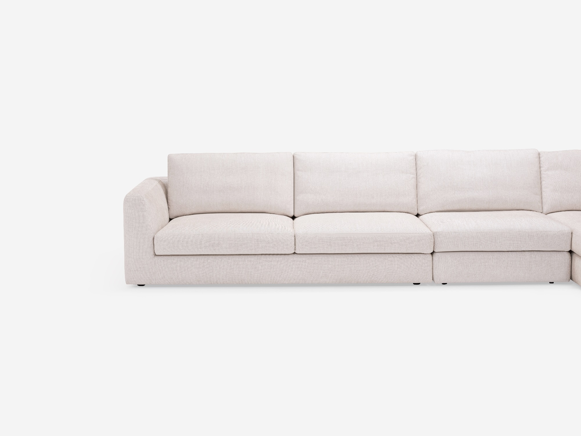 Detail view of the modern sectional couch in white fabric with right hand chaise