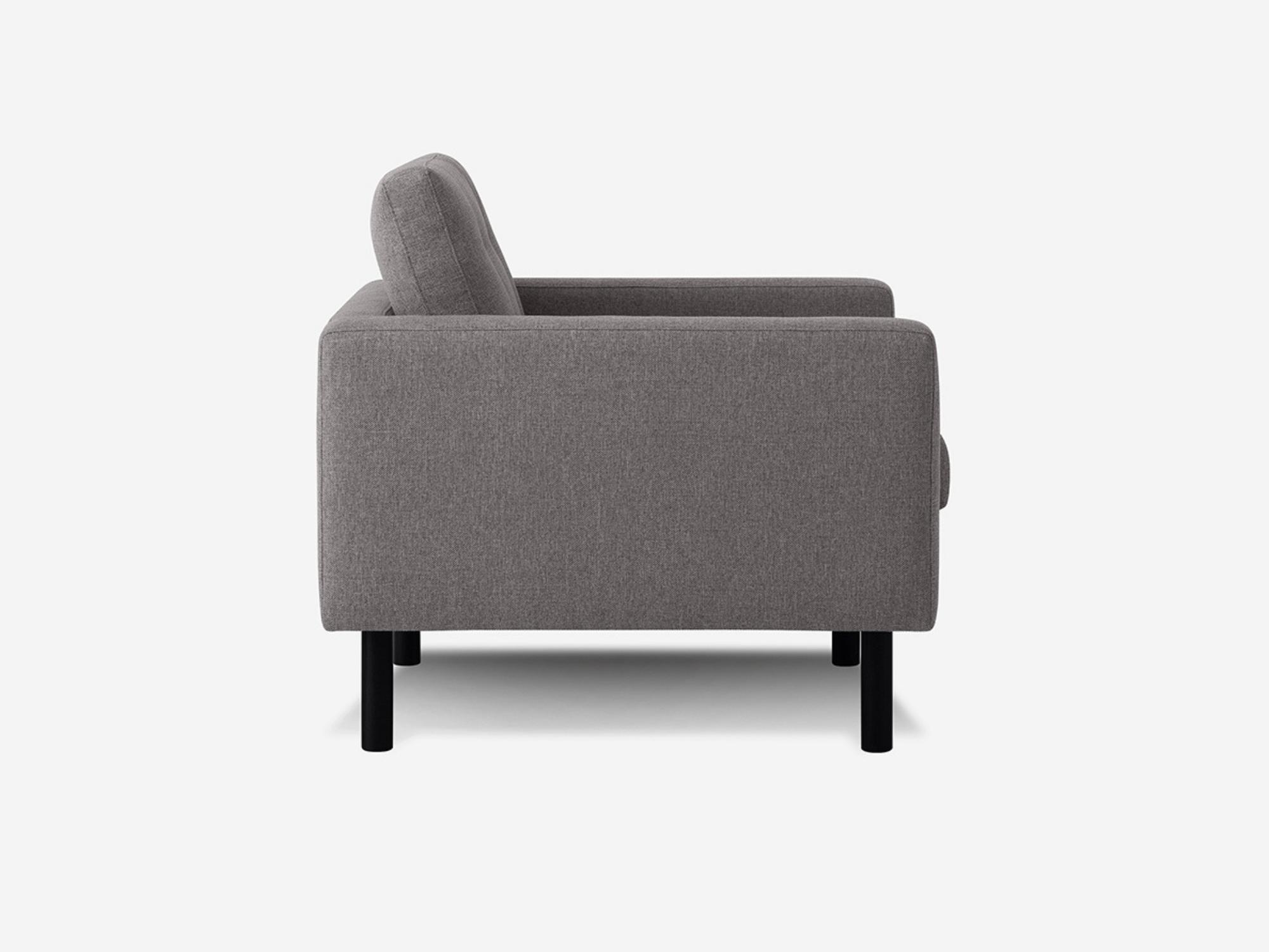 Side view of the Joan contemporary chair upholstered in grey fabric