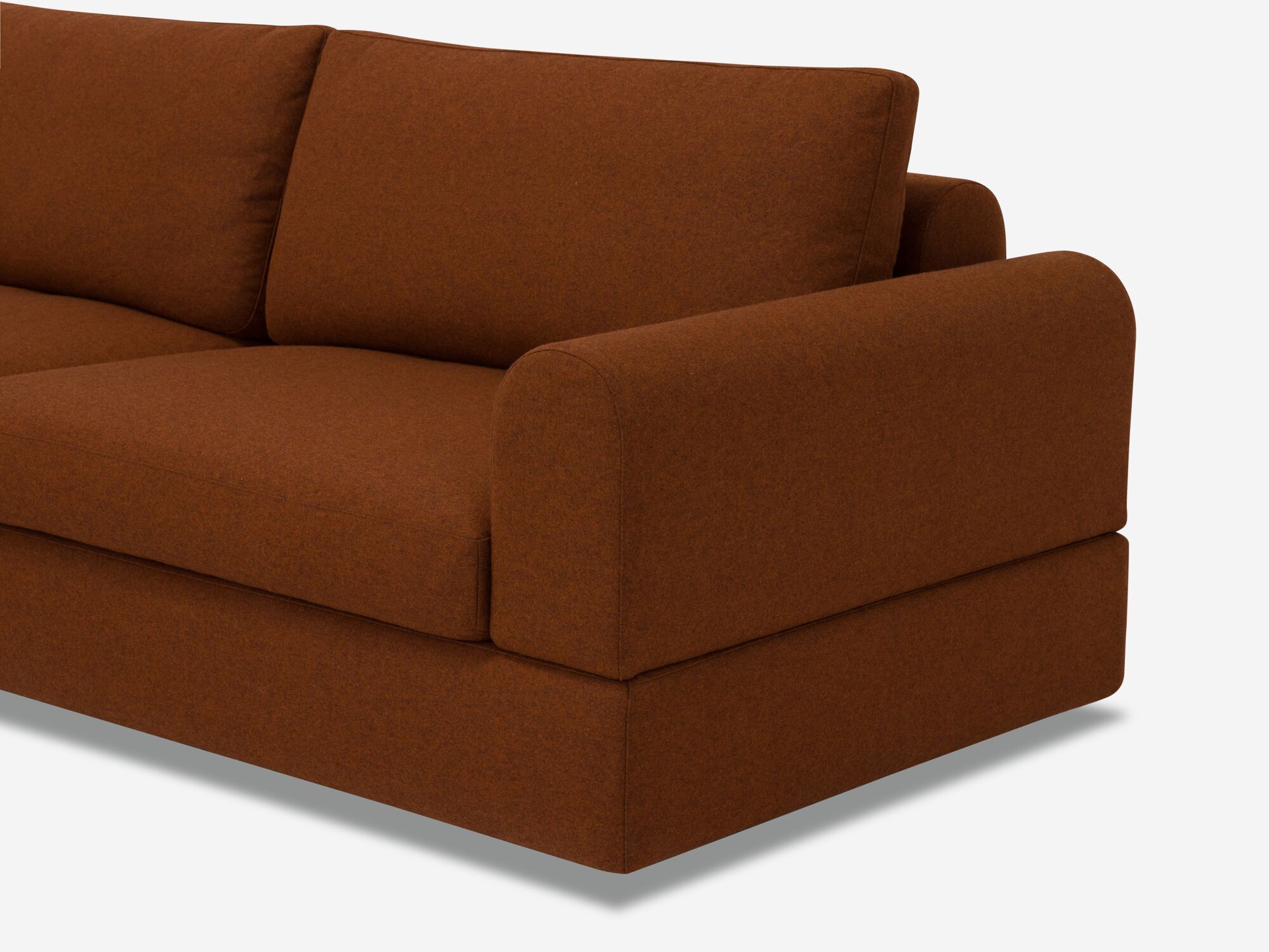 Burnt orange sectional sofa front angle detail arm view