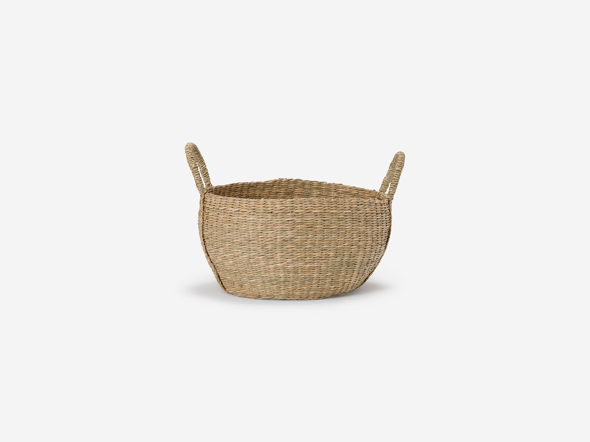 Small natural woven basket with loops side view