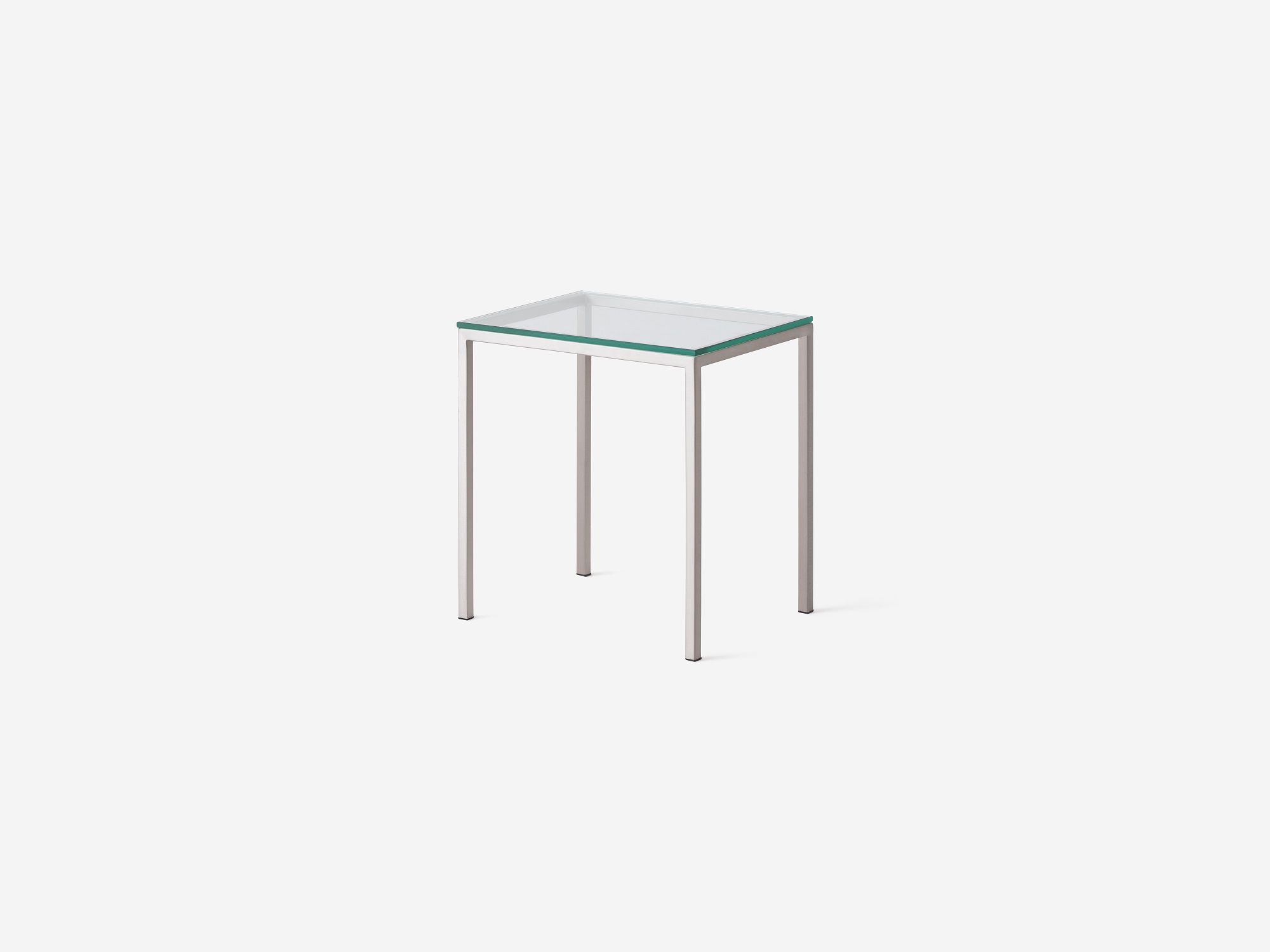 Front angle view of glass top and stainless steel end table