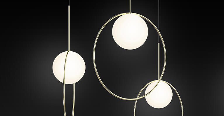 three halo shape lighting pendants are shown against a black back drop. Link to Pablo category