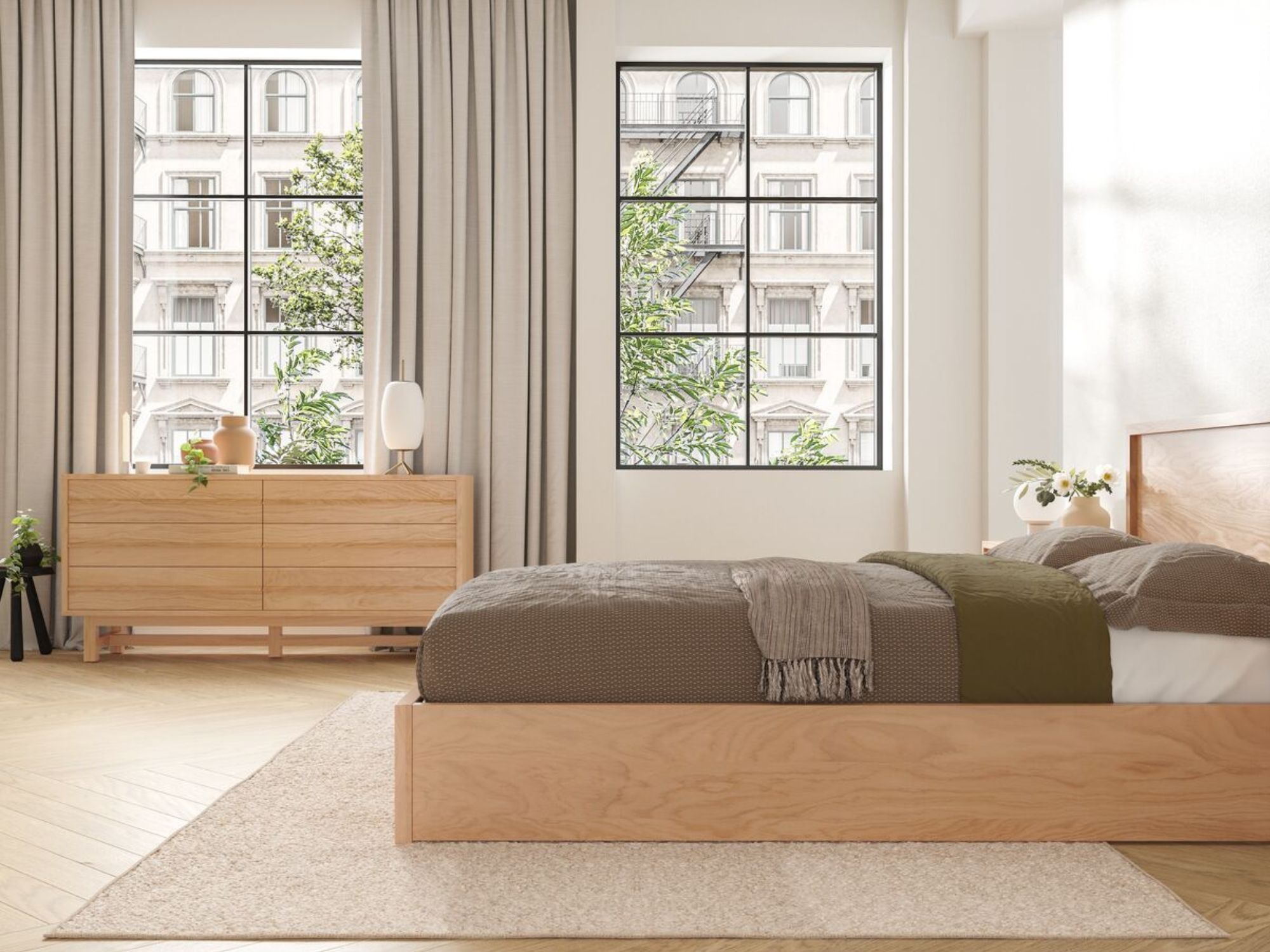 White and brass bedside lamp on dresser in modern bedroom