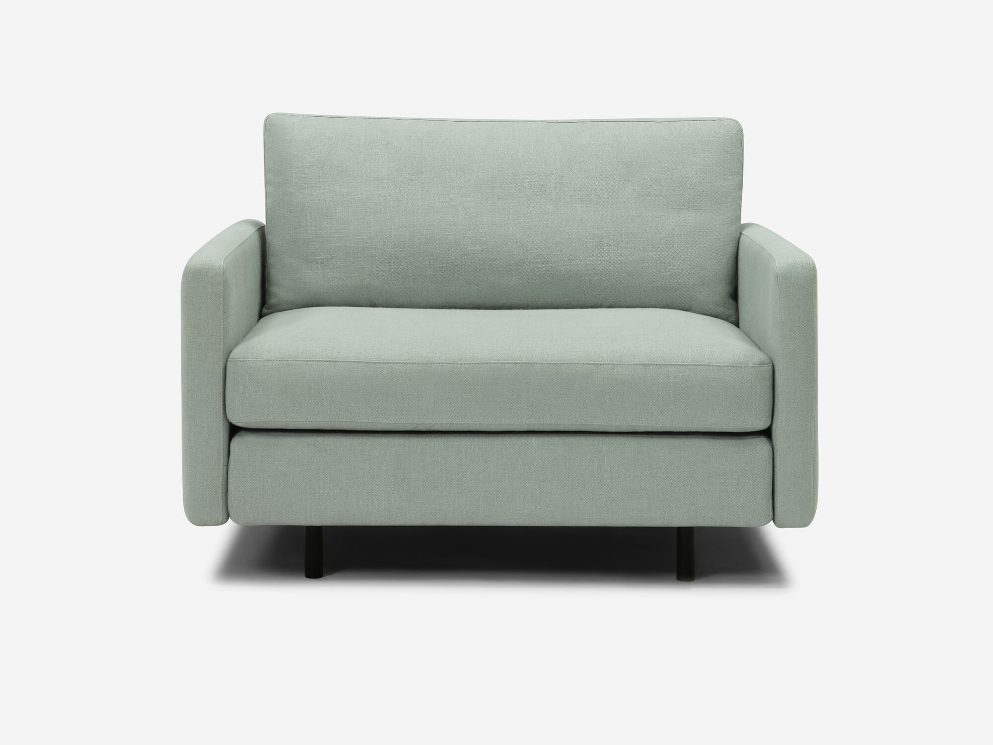 Front view of wide teal armchair