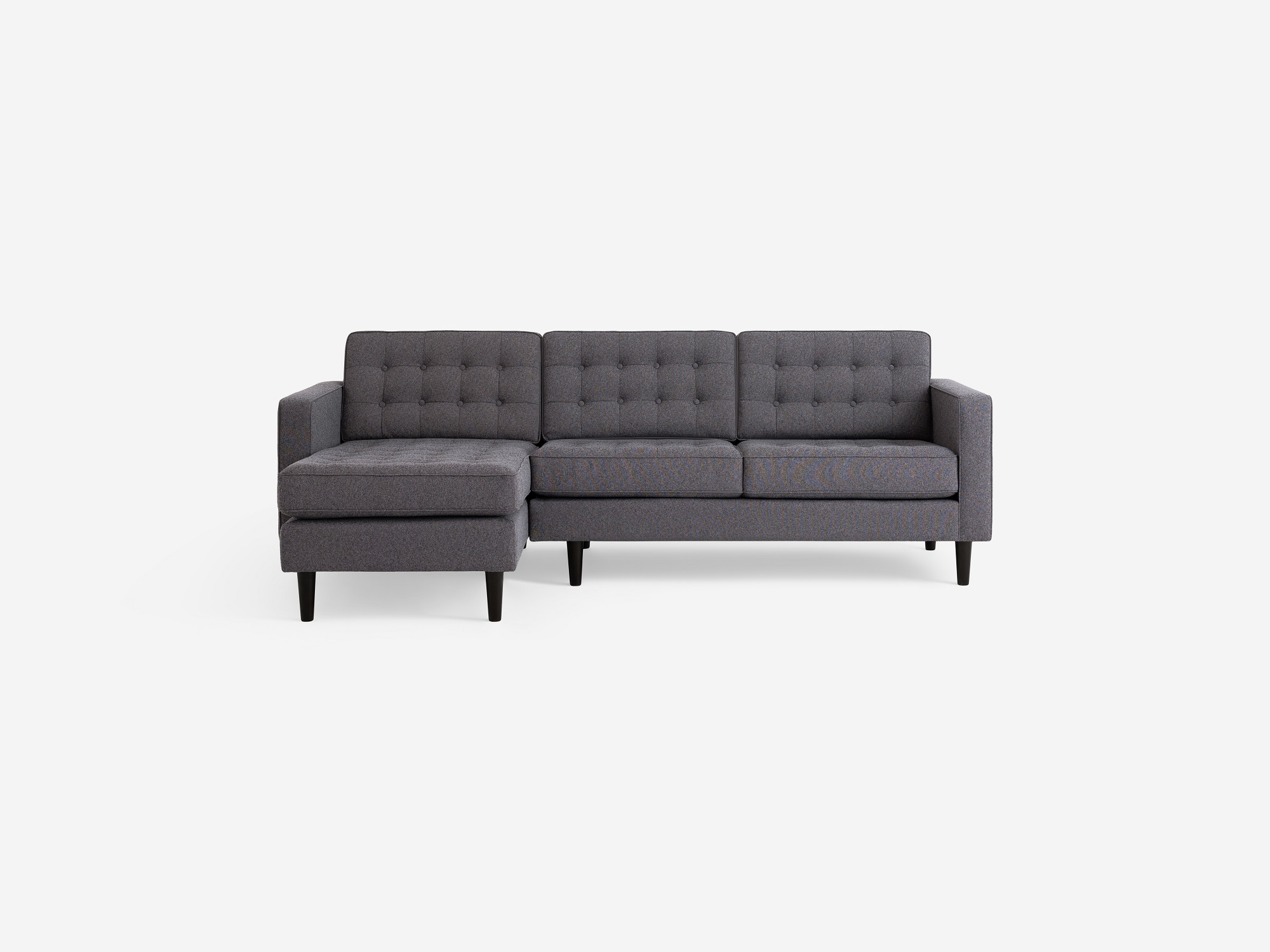 Front view of the  Reverie modern sectional sleeper sofa in grey fabric