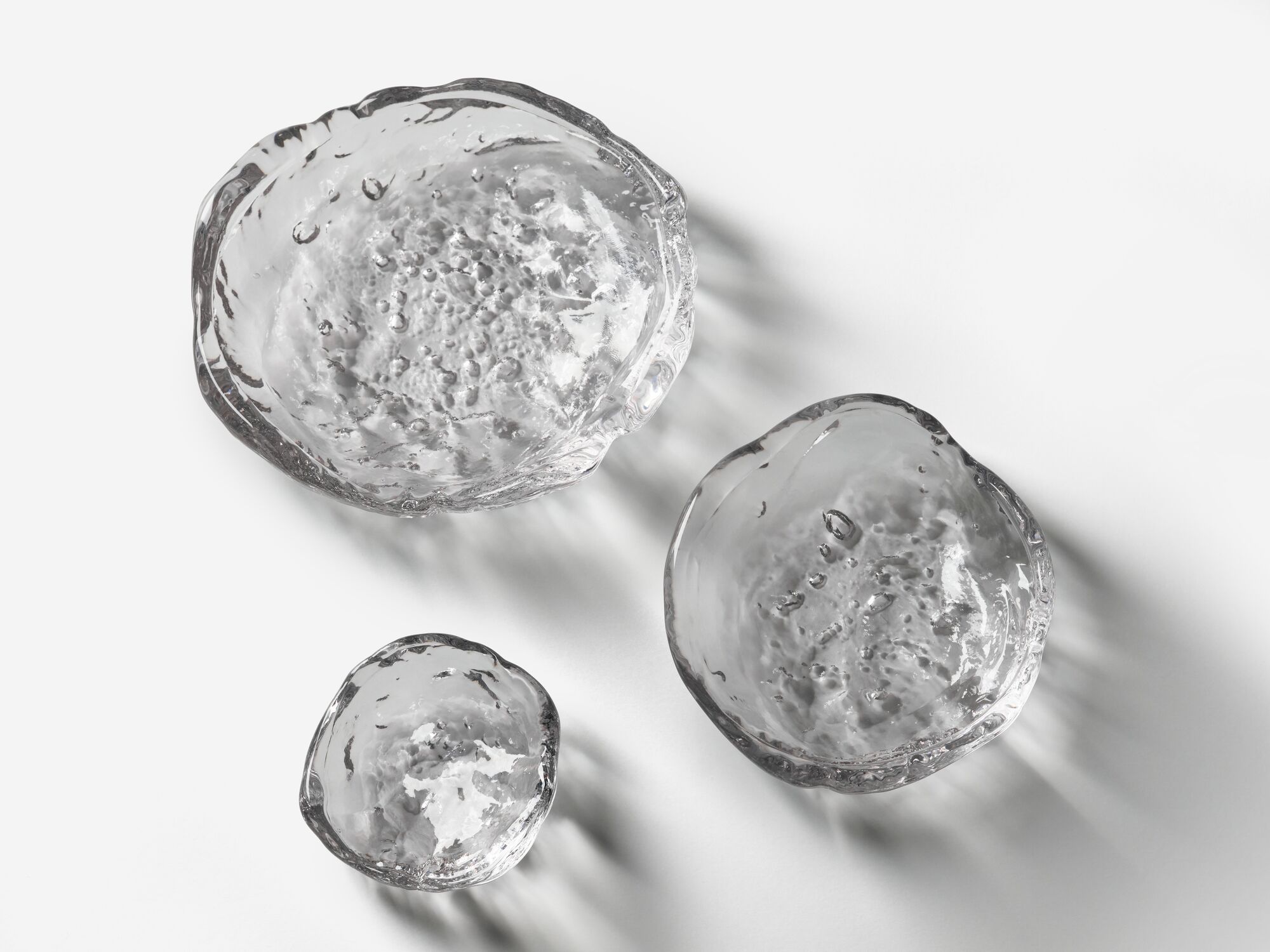 Top view of three different sized glass bowls
