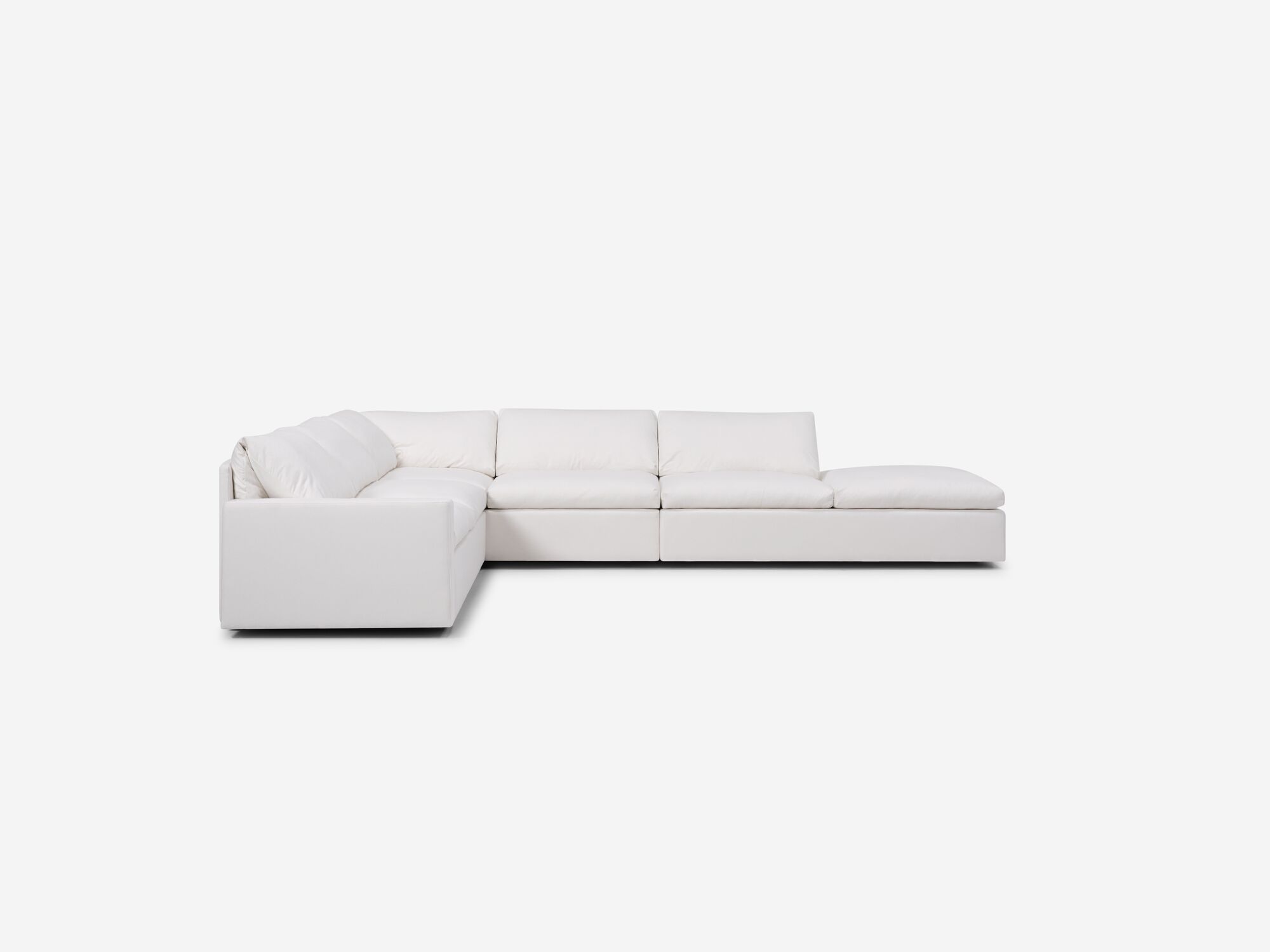 White sectional sofa with right hand chaise side view